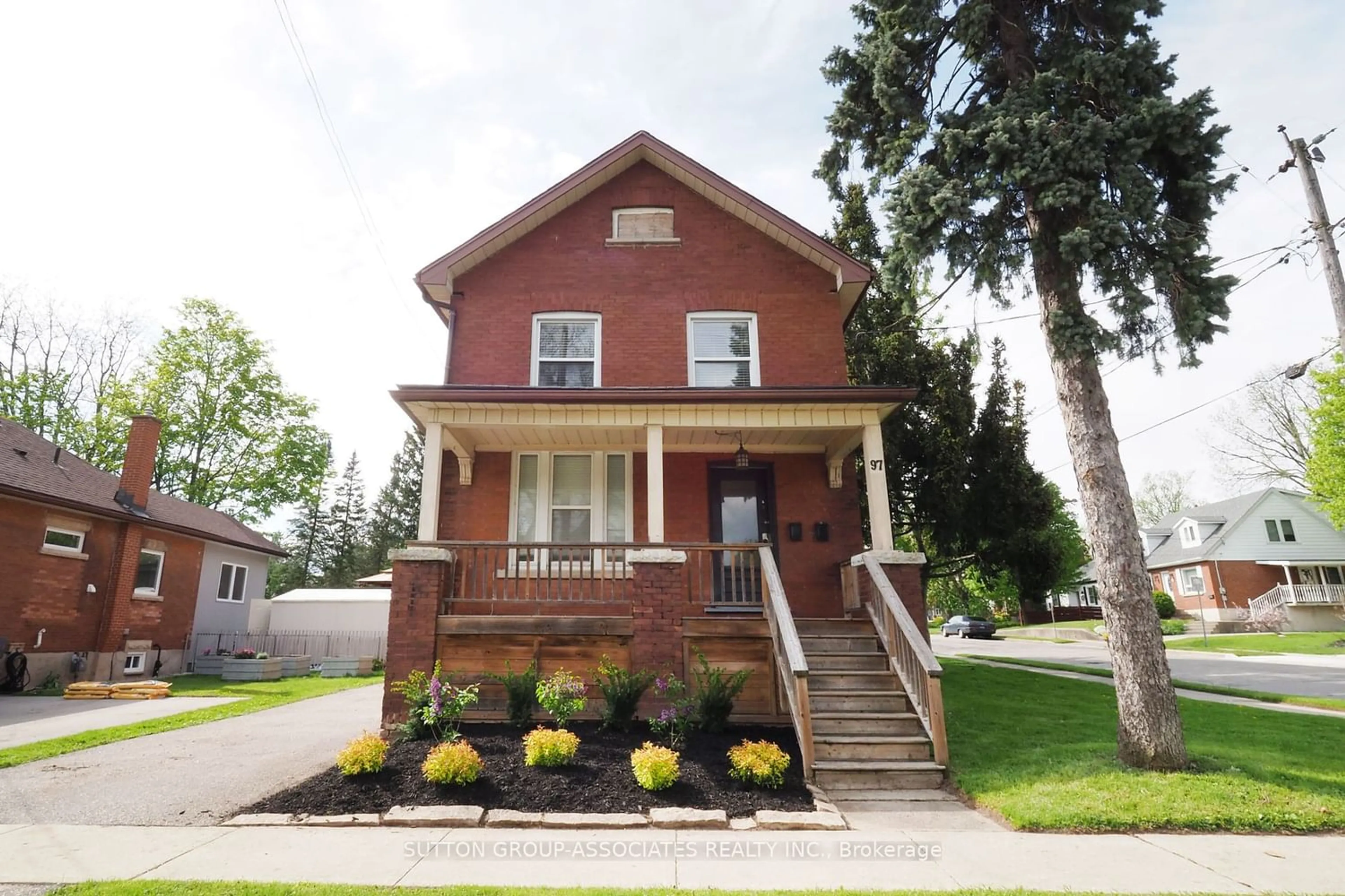 Frontside or backside of a home for 97 Division St, Guelph Ontario N1H 1R7