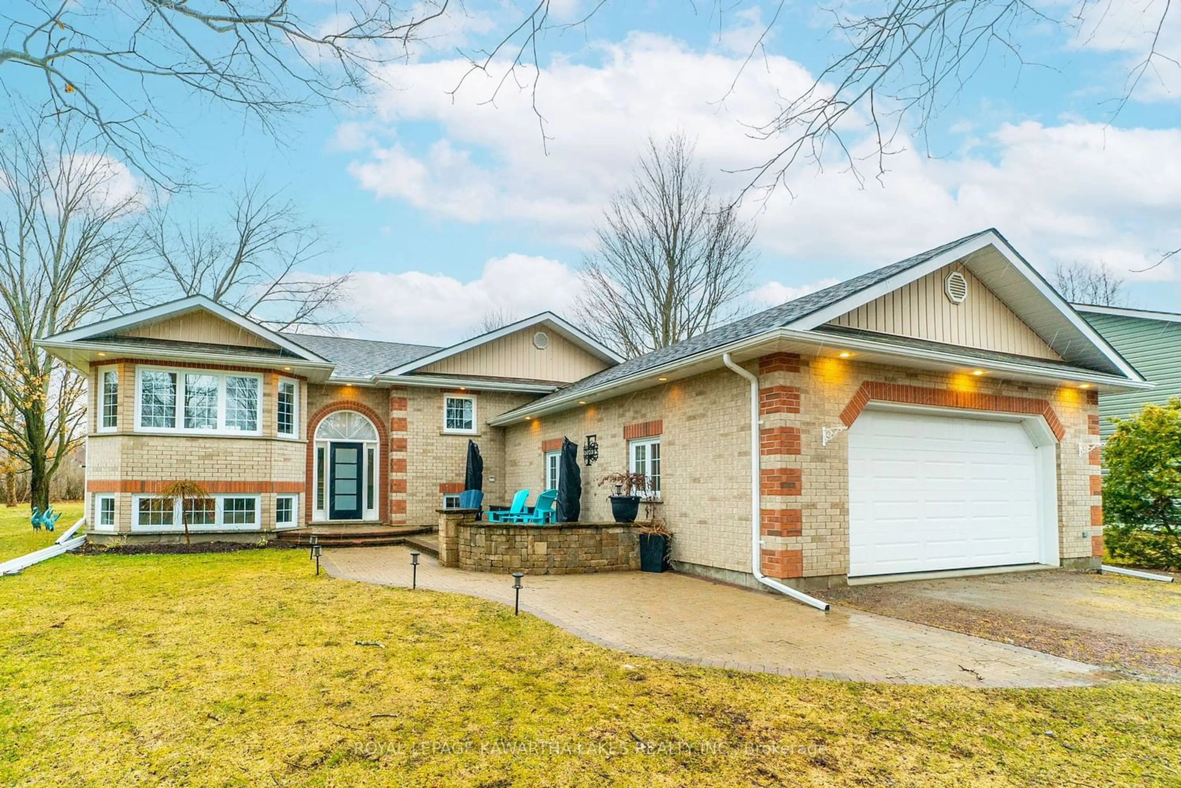 Frontside or backside of a home for 61 Homewood Park Rd, Kawartha Lakes Ontario K0M 2B0