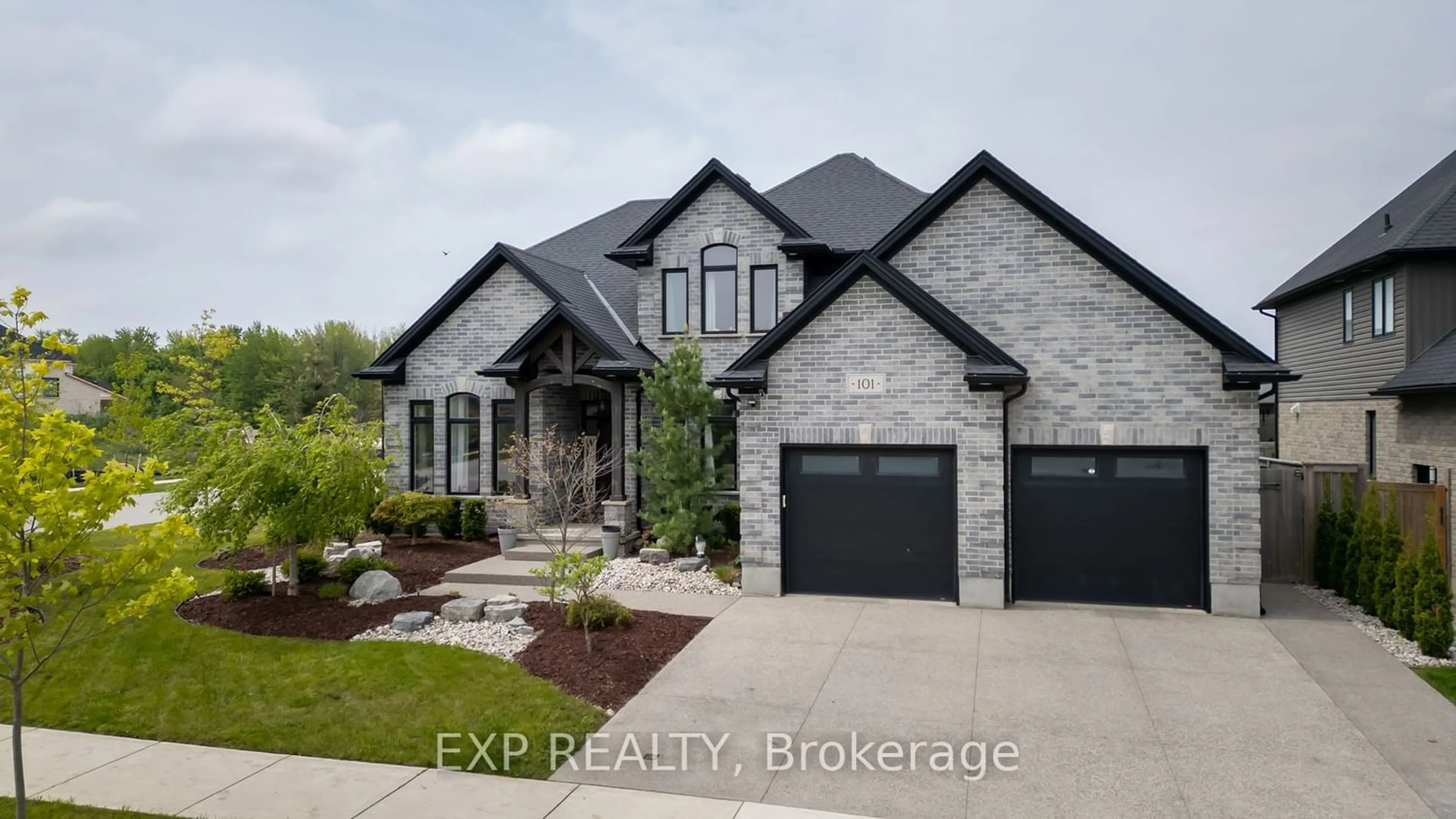 Home with brick exterior material for 101 Mossy Wood Walk, Middlesex Centre Ontario N0M 2A0