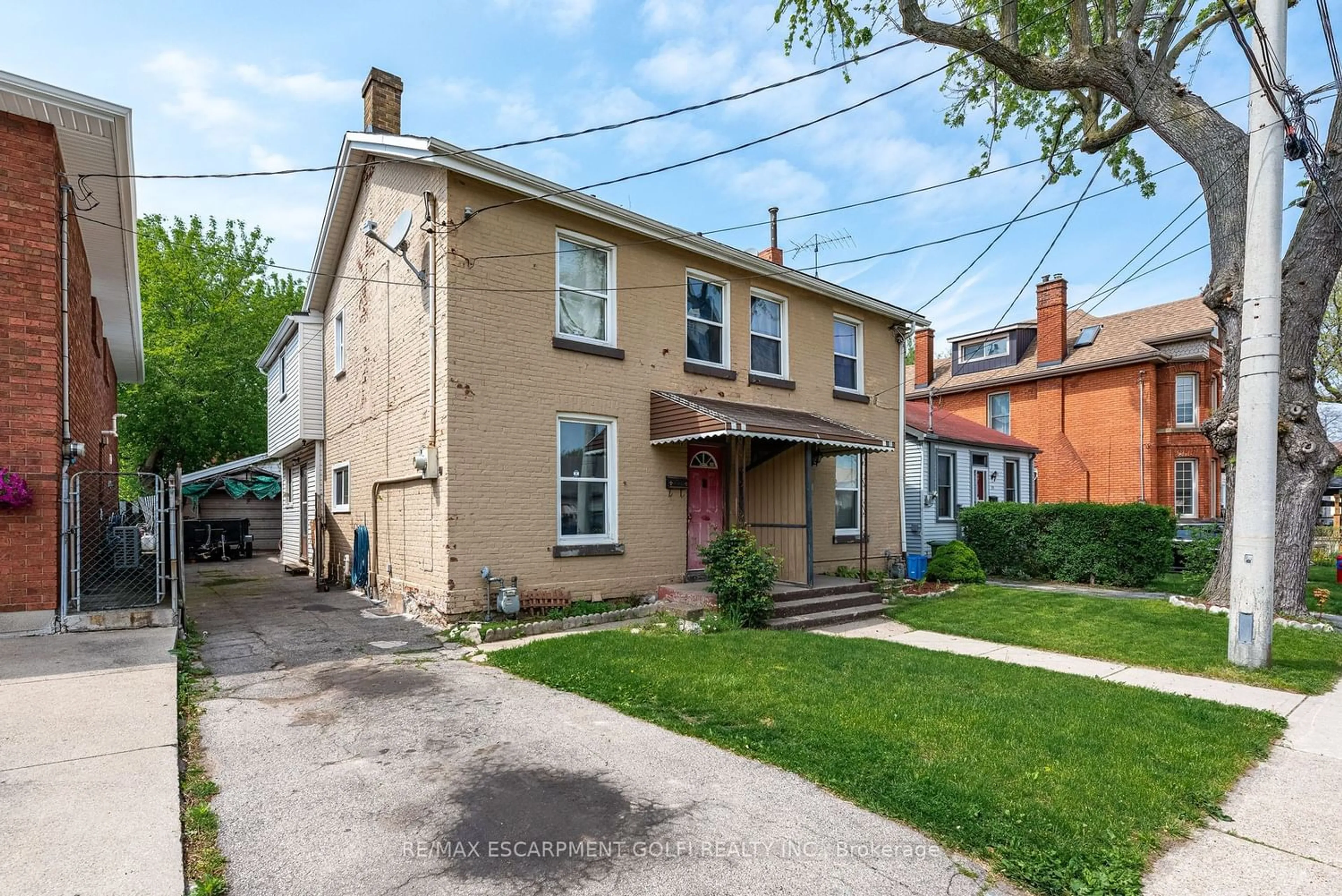 Frontside or backside of a home for 167 Locke St, Hamilton Ontario L8R 3B1