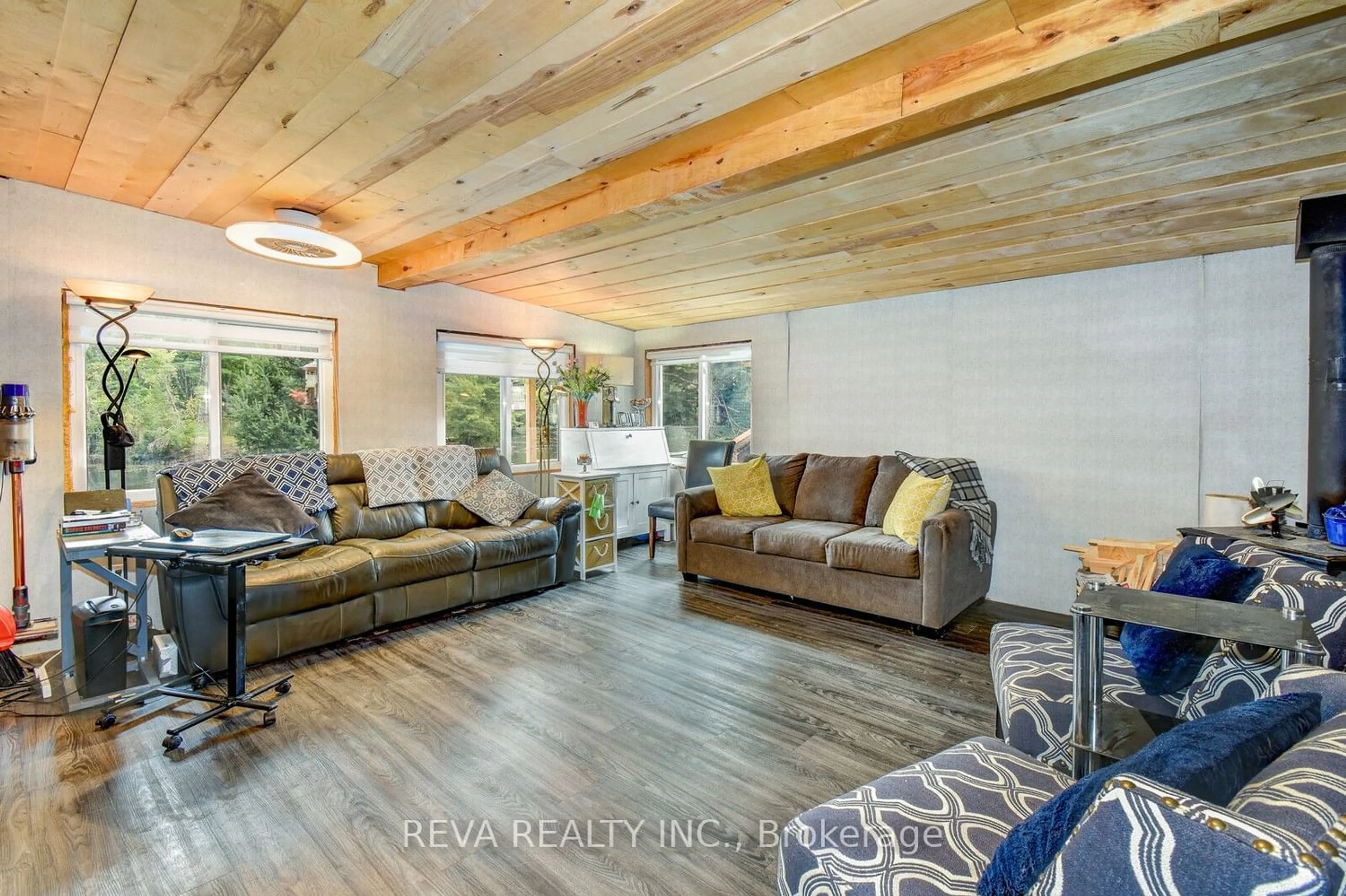 Living room, wood floors for 5774 Weslemkoon Lake Rd, Addington Highlands Ontario K0L 1W0