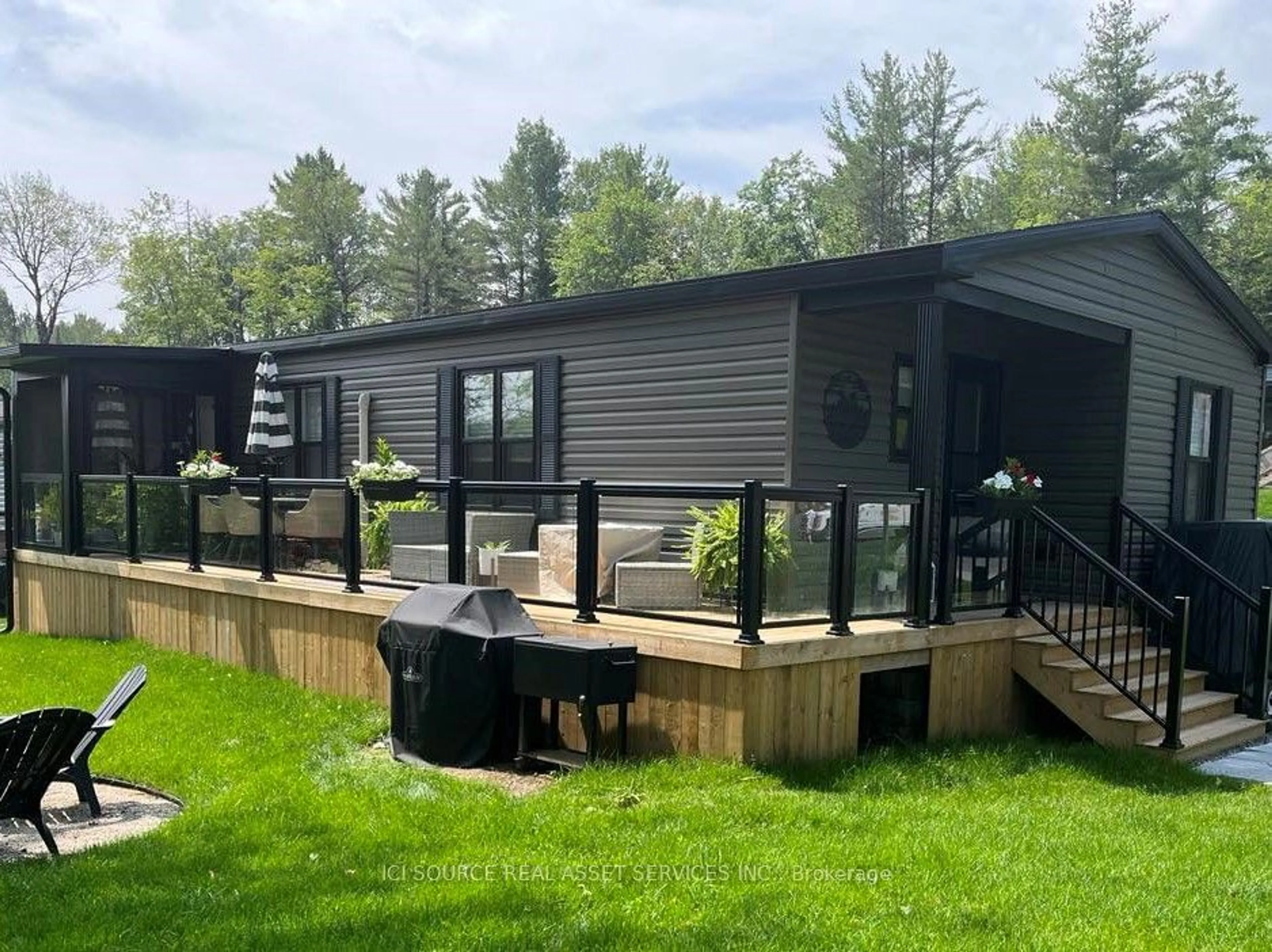 Frontside or backside of a home for 1047 Bonnie Lake Camp Rd #Btnb085, Bracebridge Ontario P1L 1W9