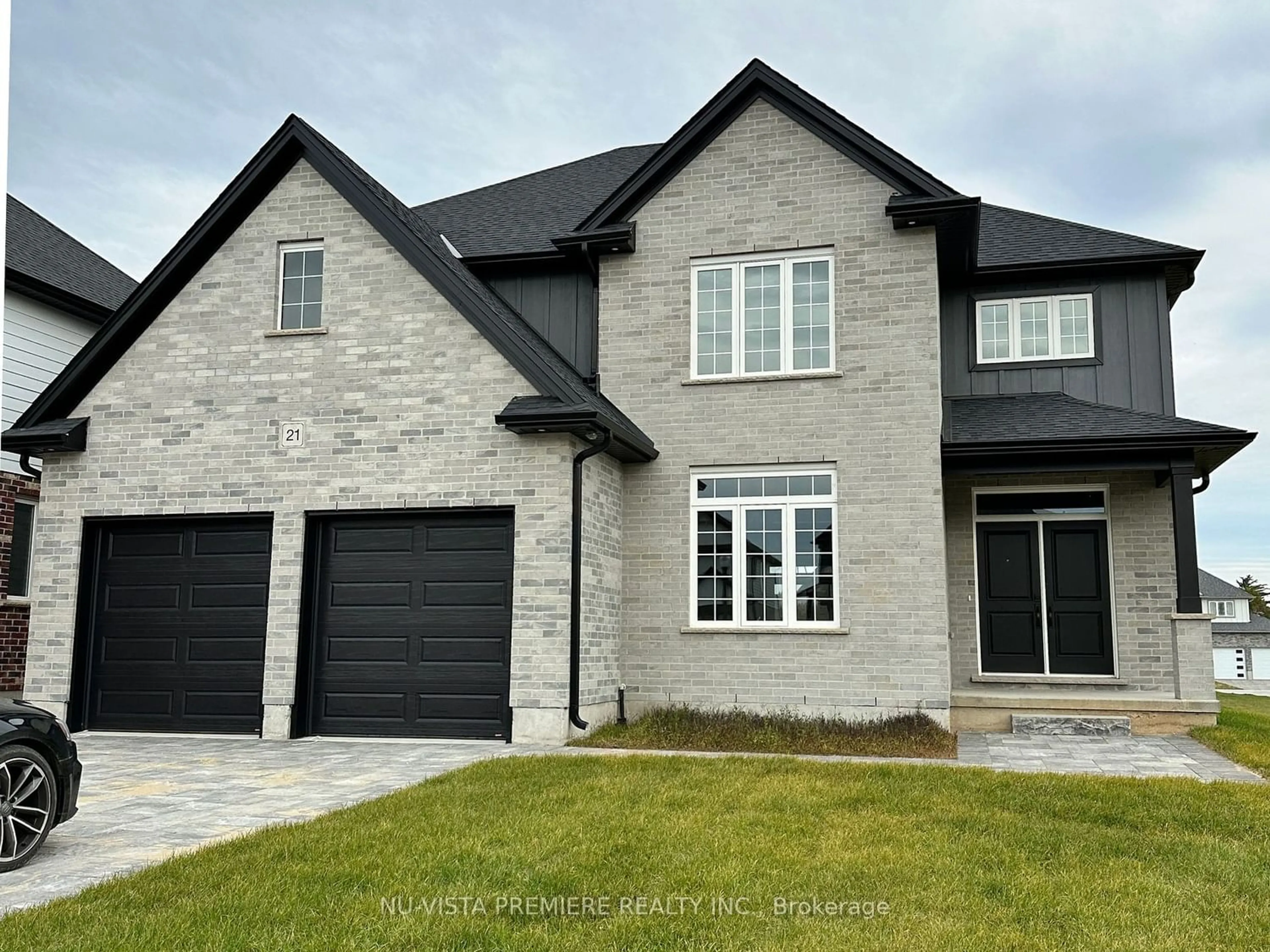 Home with brick exterior material for 21 Greenbrier Rdge, Thames Centre Ontario N0L 1G3