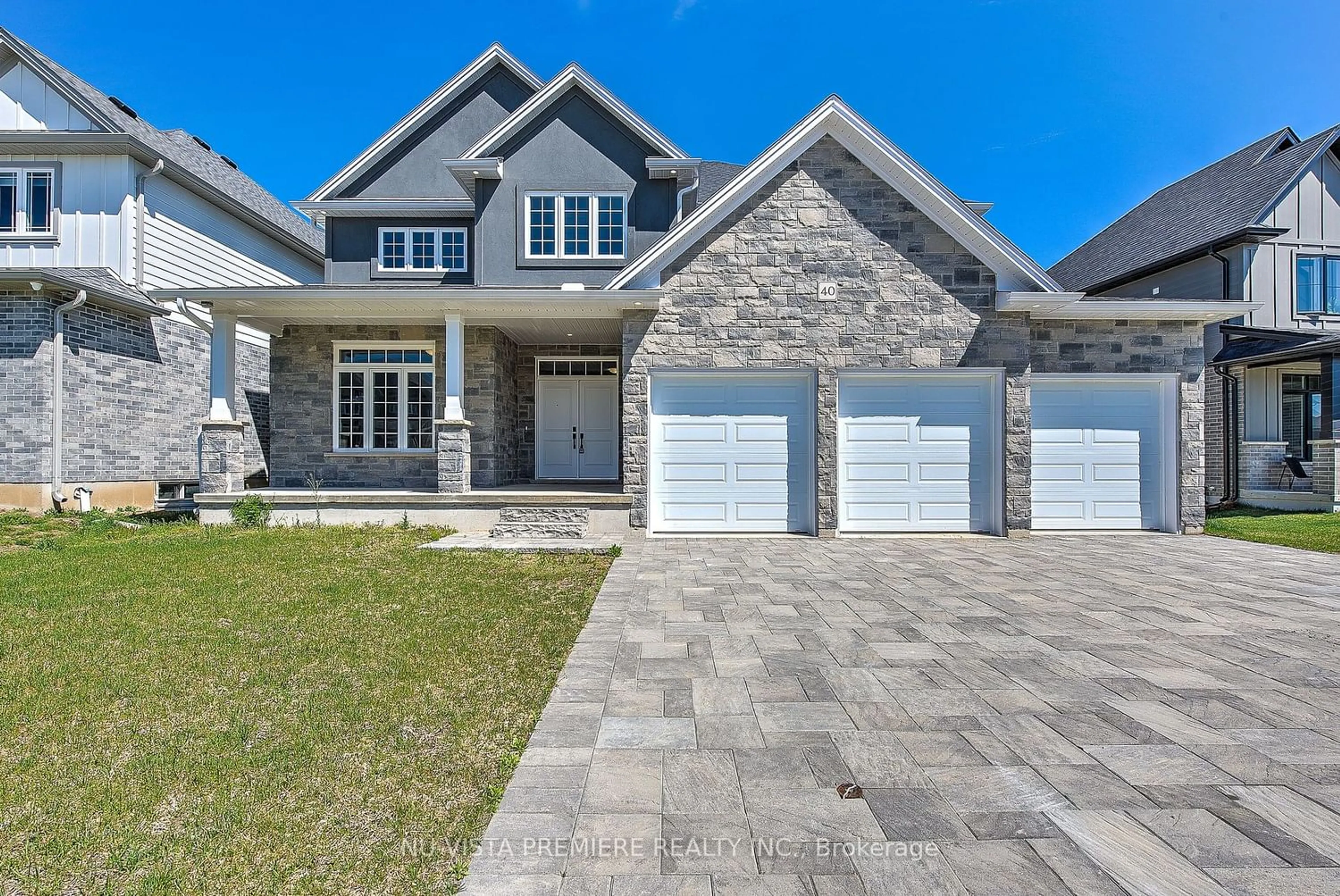 Home with brick exterior material for 40 Hazelwood Pass, Thames Centre Ontario N0L 1G3