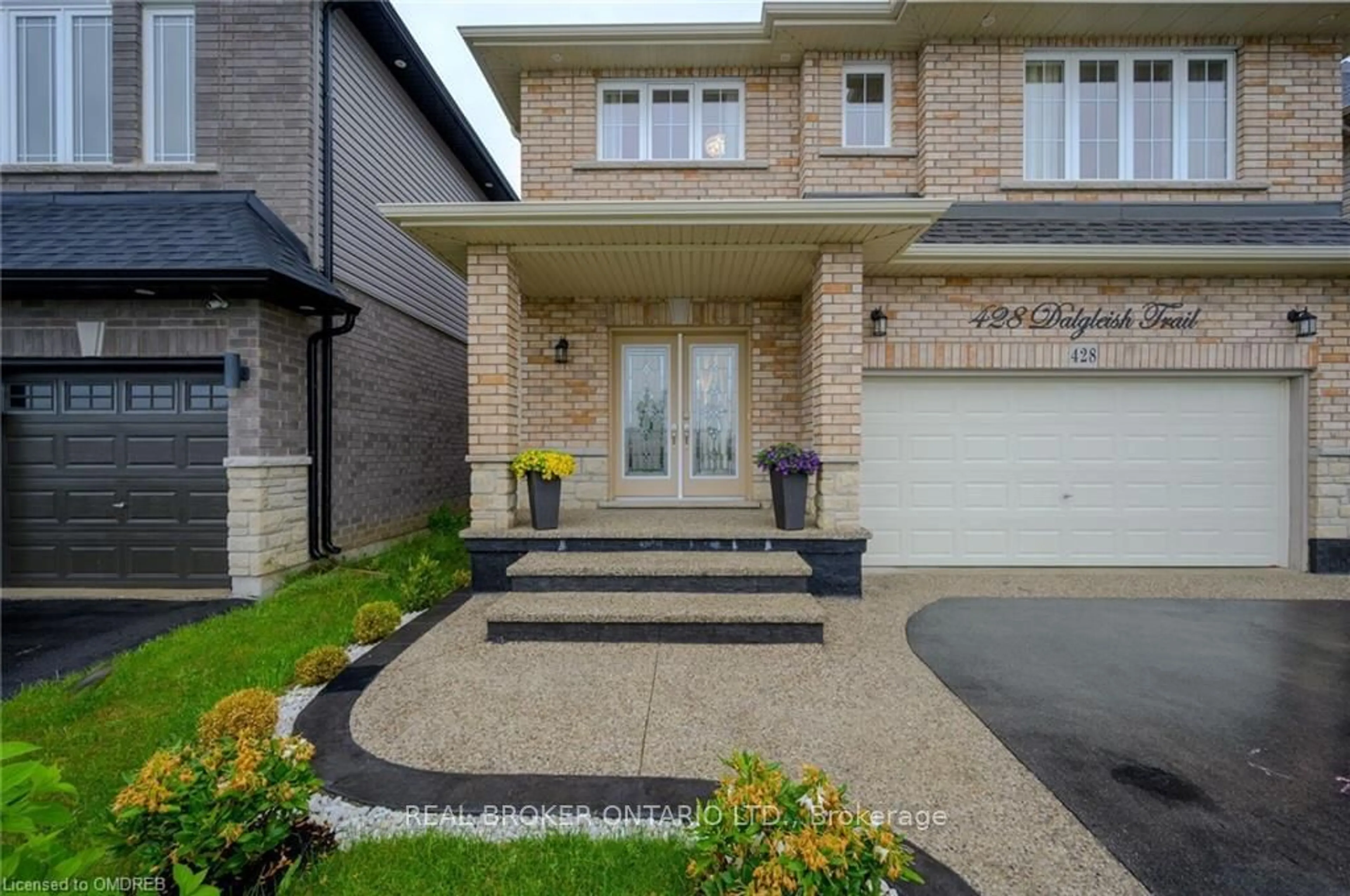 Home with brick exterior material for 428 Dalgleish Tr, Hamilton Ontario L0R 1P0