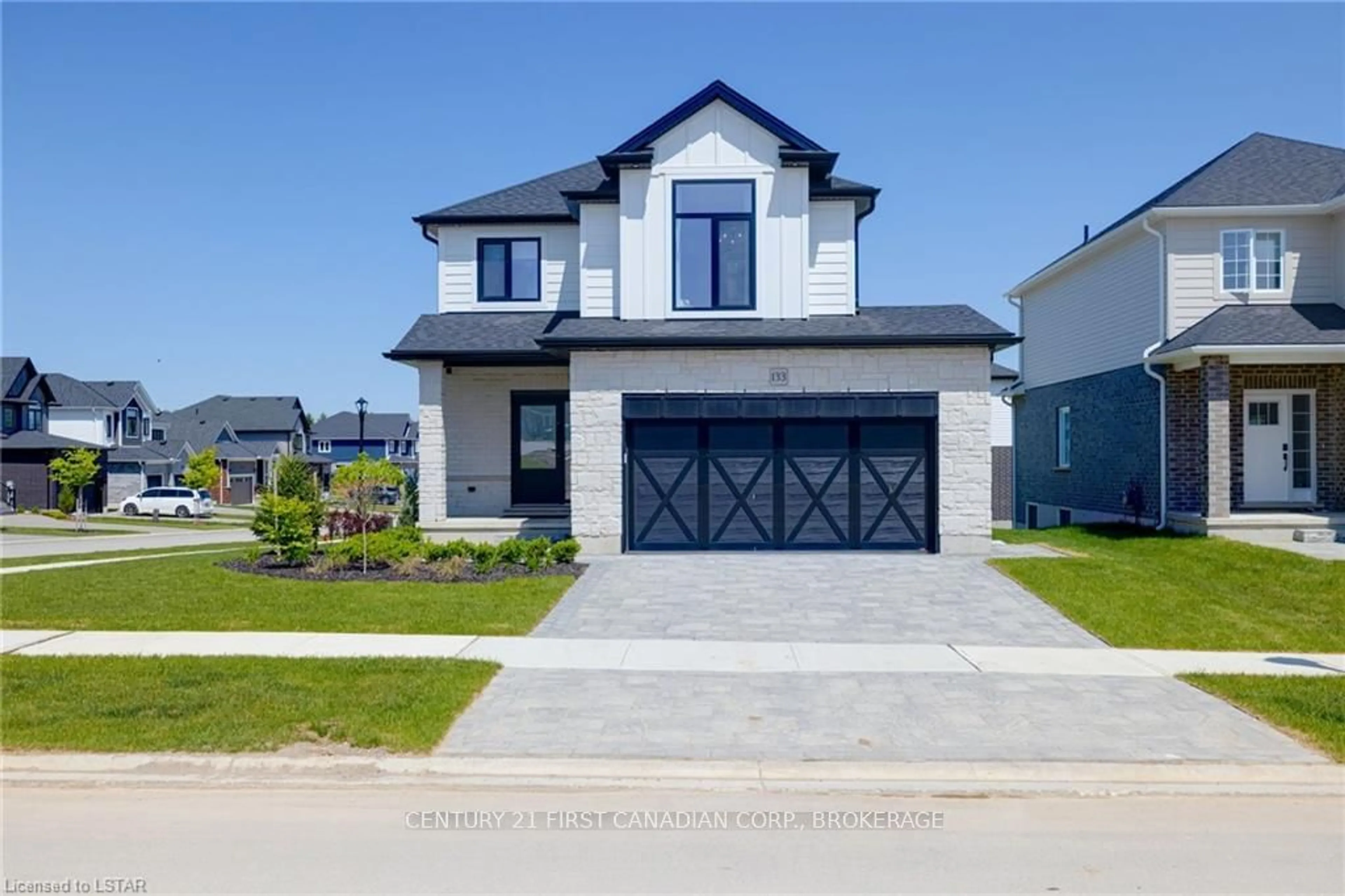 Frontside or backside of a home, the street view for 133 BASIL Cres, Middlesex Centre Ontario N0M 2A0