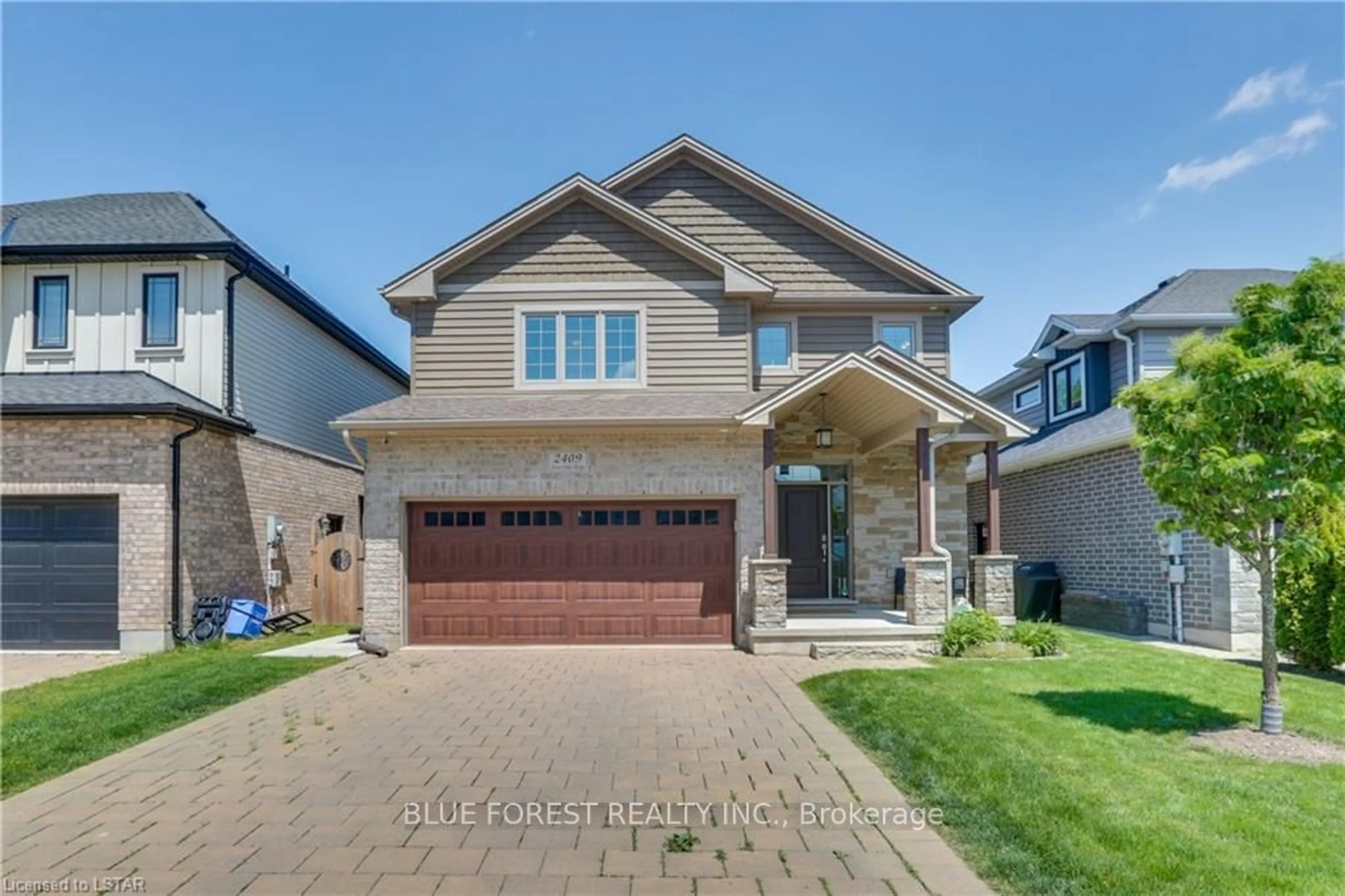 Frontside or backside of a home for 2409 Seven Oaks Ridge, London Ontario N6M 0E4