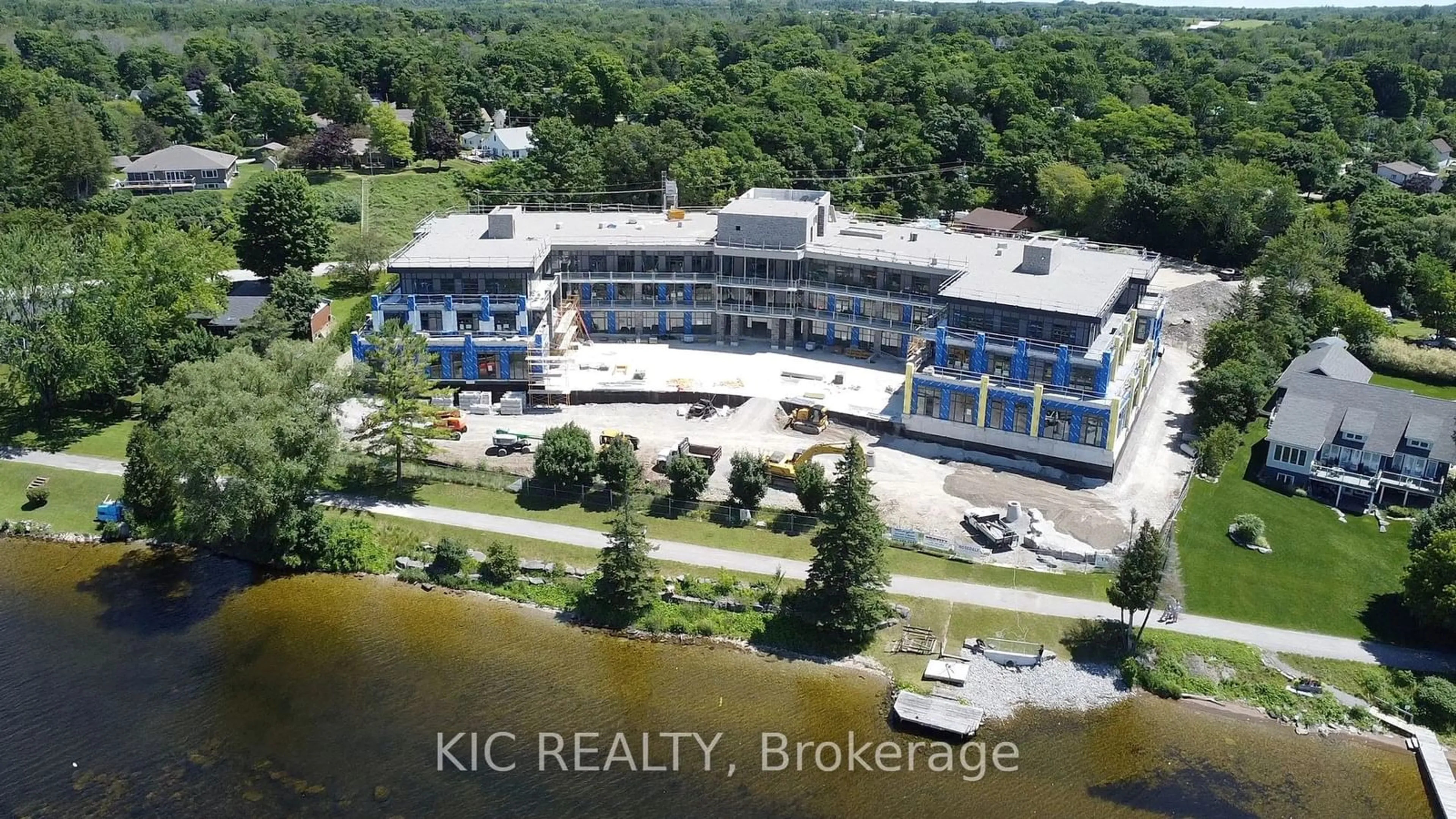 A pic from outside/outdoor area/front of a property/back of a property/a pic from drone, water/lake/river/ocean view for 99 Louisa St #107, Kawartha Lakes Ontario K0M 1N0