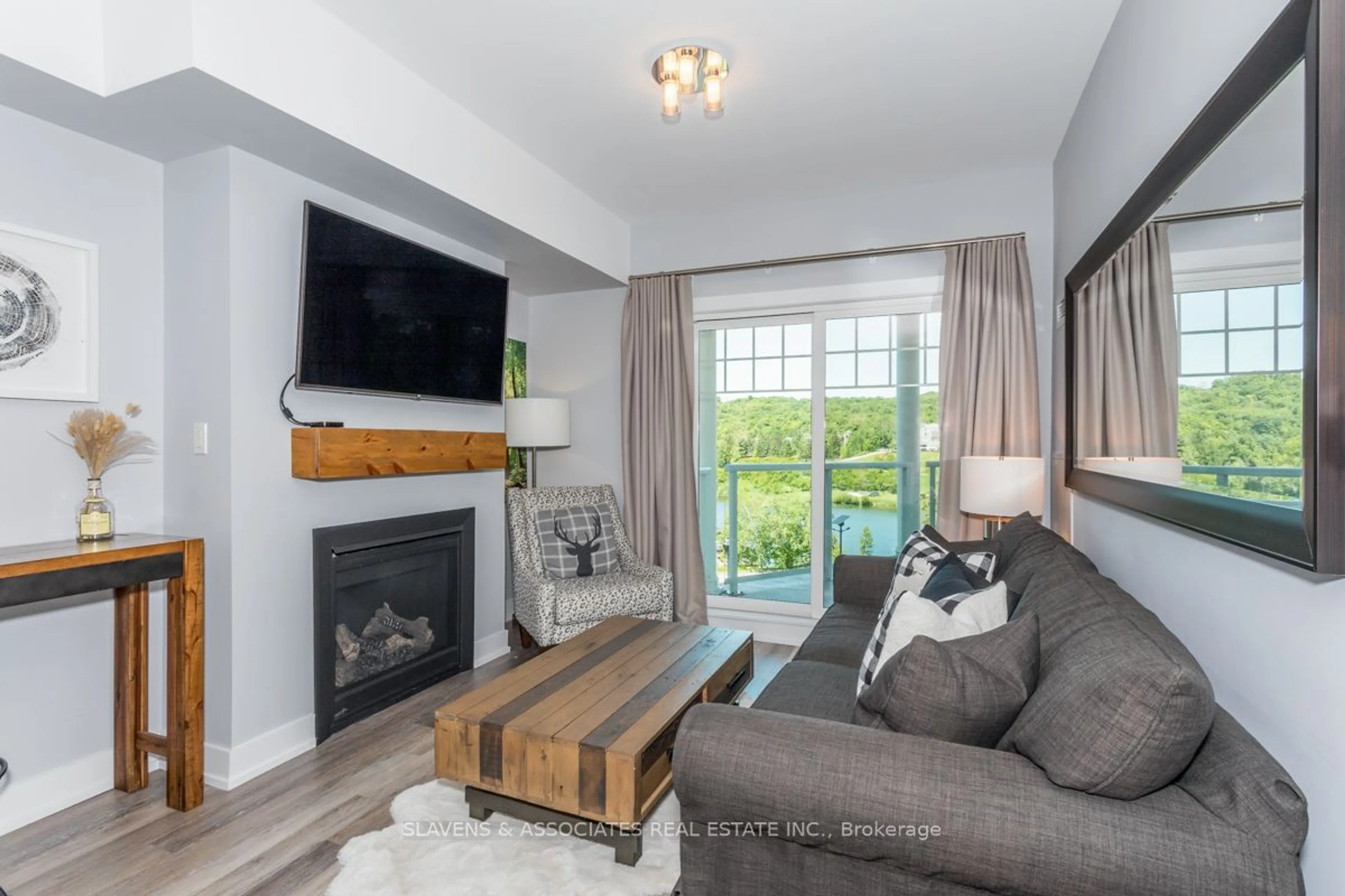 Living room for 25 Pen Lake Point Rd #306, Huntsville Ontario P1H 1A9