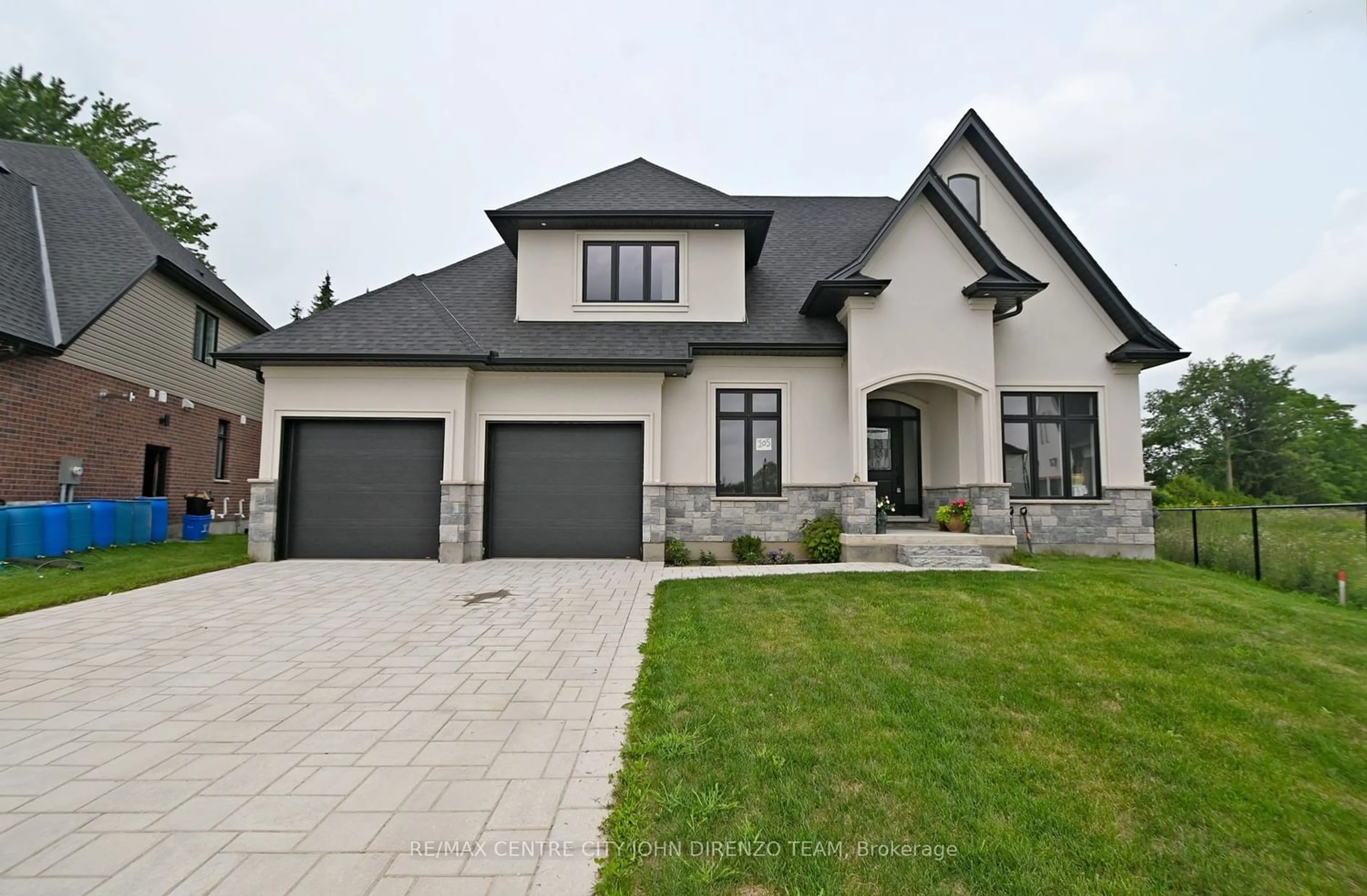 Frontside or backside of a home for 105 Aspen Circ, Thames Centre Ontario N0M 2P0