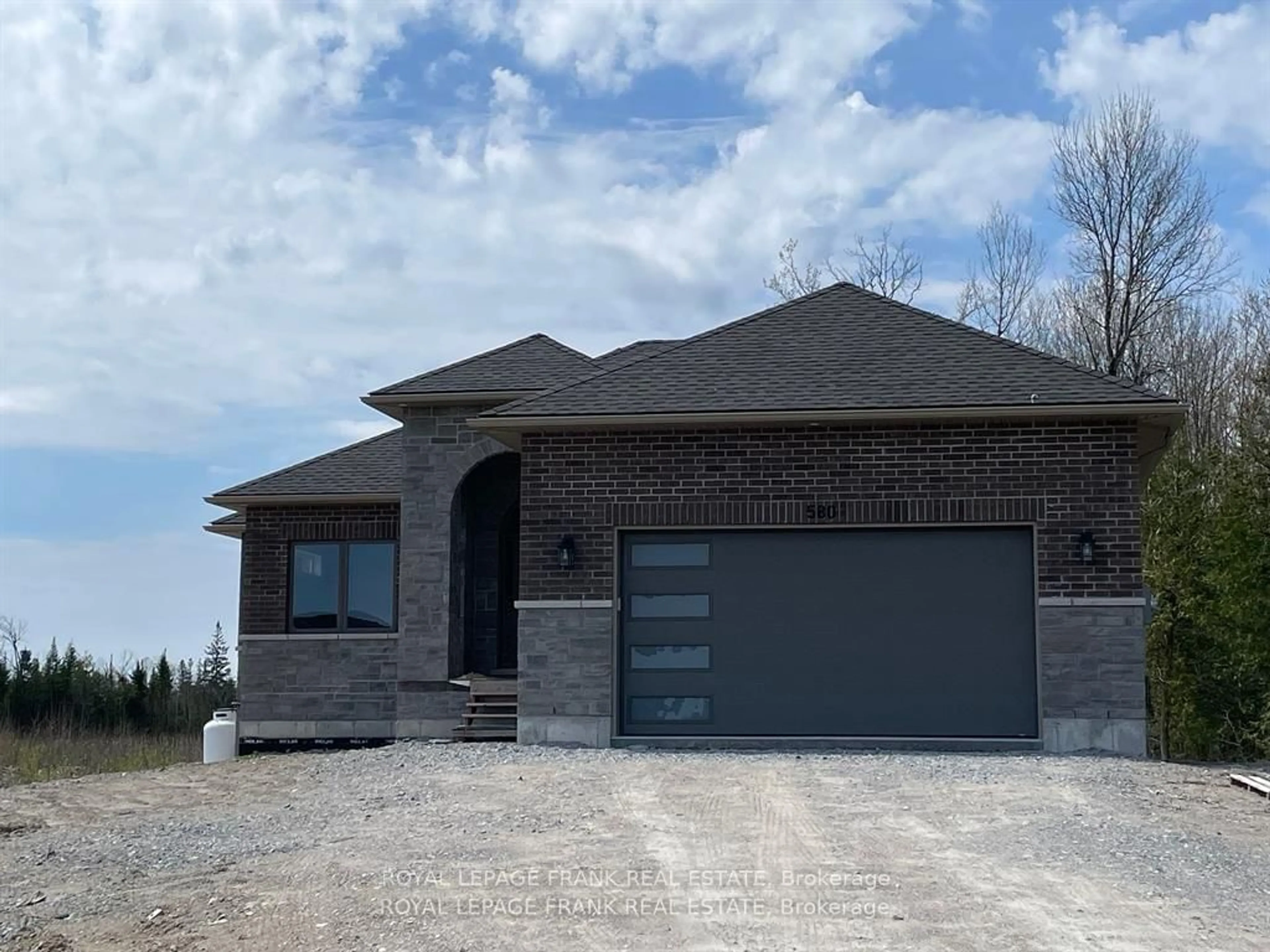 Home with brick exterior material for 580 Patterson Rd, Kawartha Lakes Ontario K0M 1N0