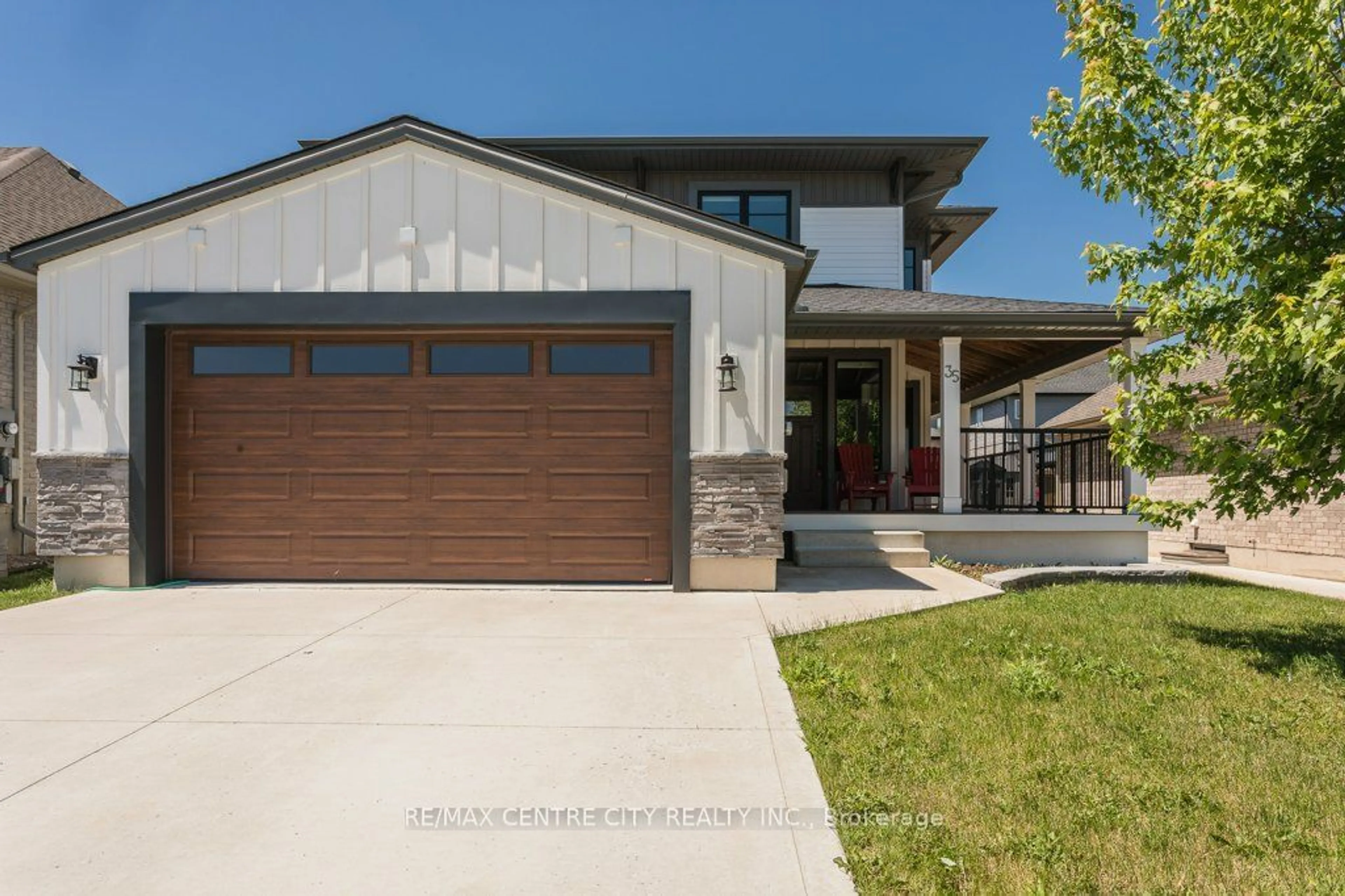 Home with vinyl exterior material, street for 35 Honey Bend, St. Thomas Ontario N5R 0H6
