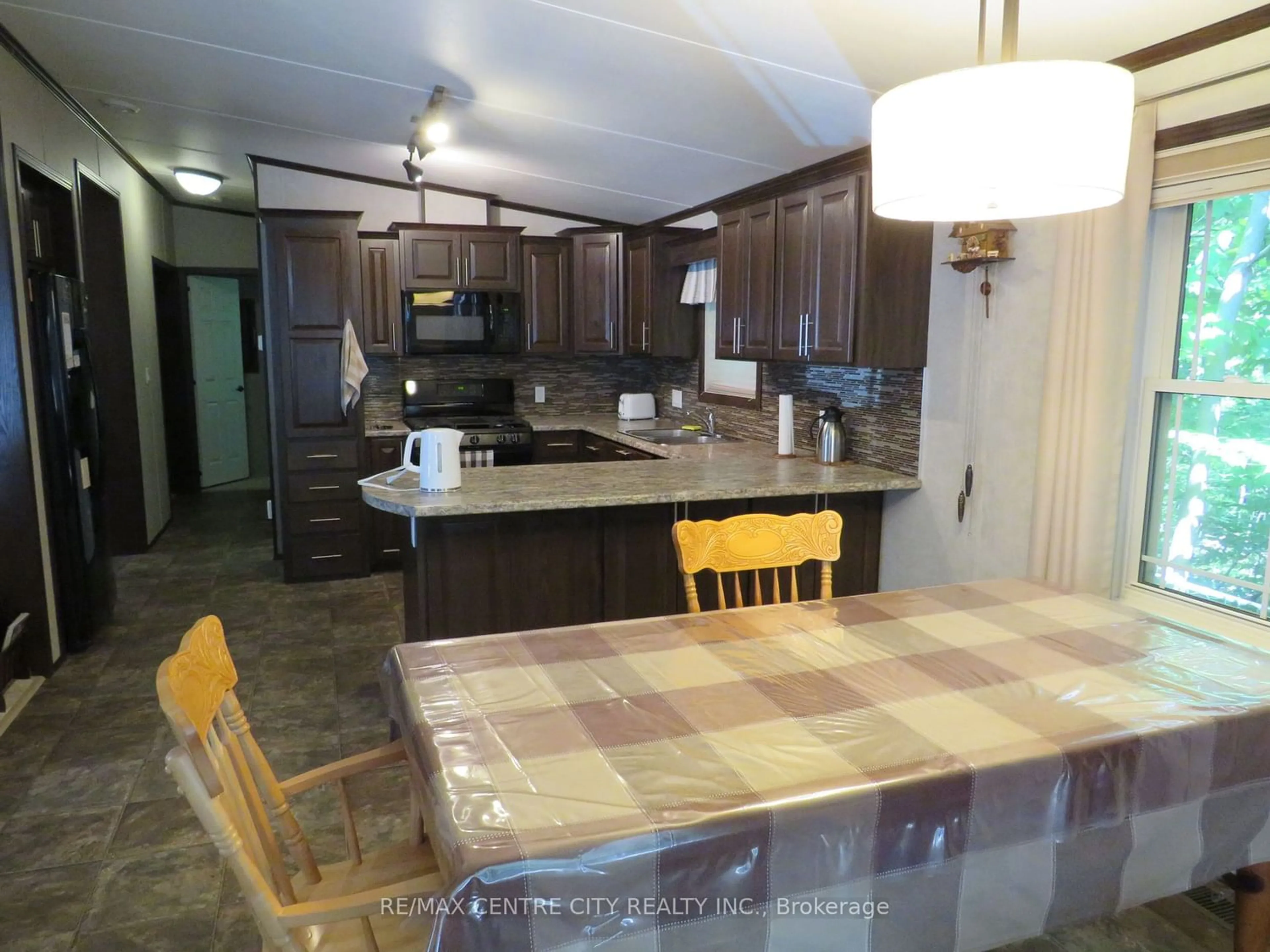 Open concept kitchen, unknown for 22790 AMIENS Rd #163, Middlesex Centre Ontario N0L 1R0