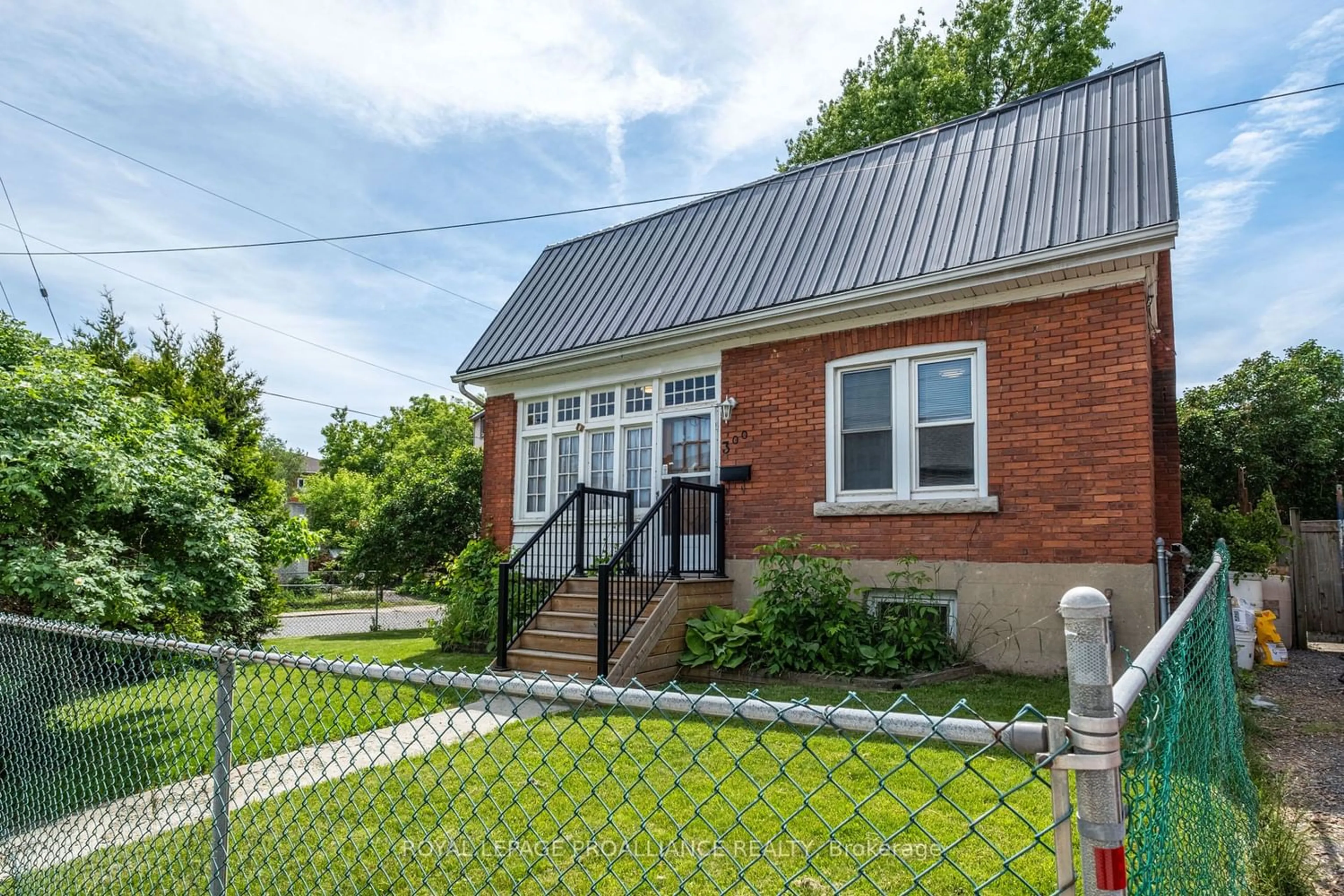 Frontside or backside of a home for 300 Division St, Kingston Ontario K7K 3Z9