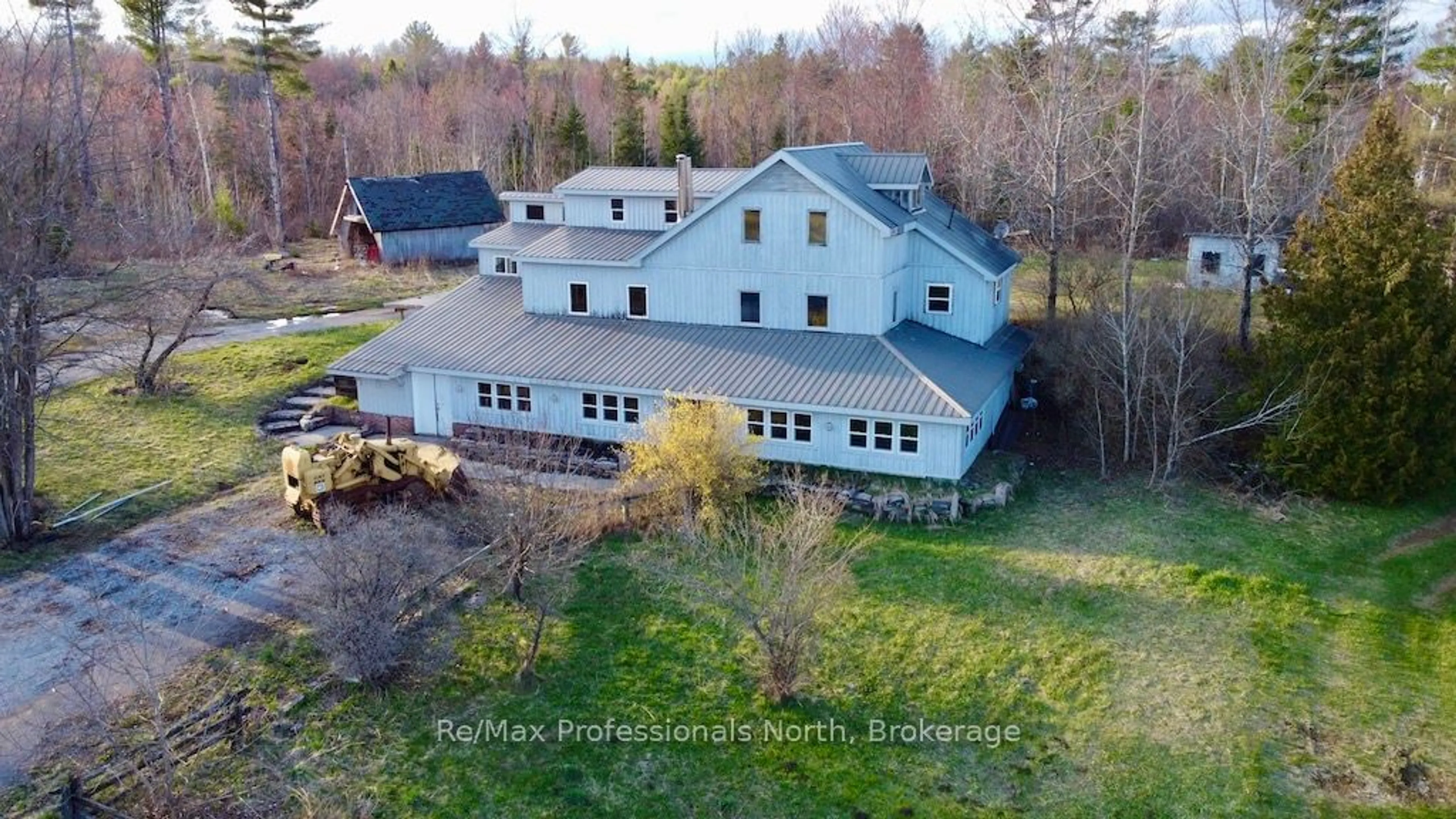A pic from outside/outdoor area/front of a property/back of a property/a pic from drone, building for 4177 County Road 121, Minden Hills Ontario K0M 2A0