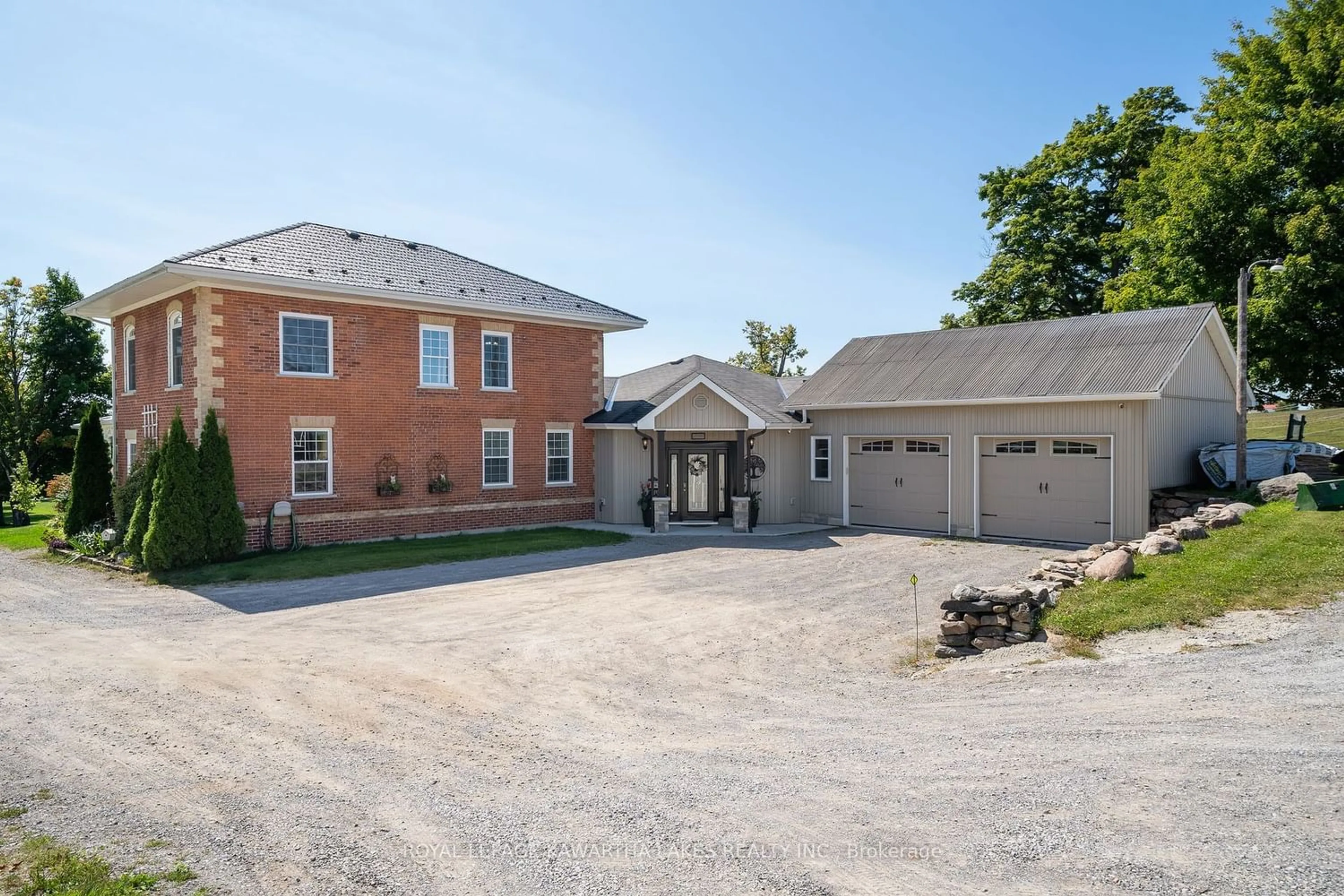 Home with brick exterior material for 542 Lily Lake Rd, Smith-Ennismore-Lakefield Ontario K9J 6X3