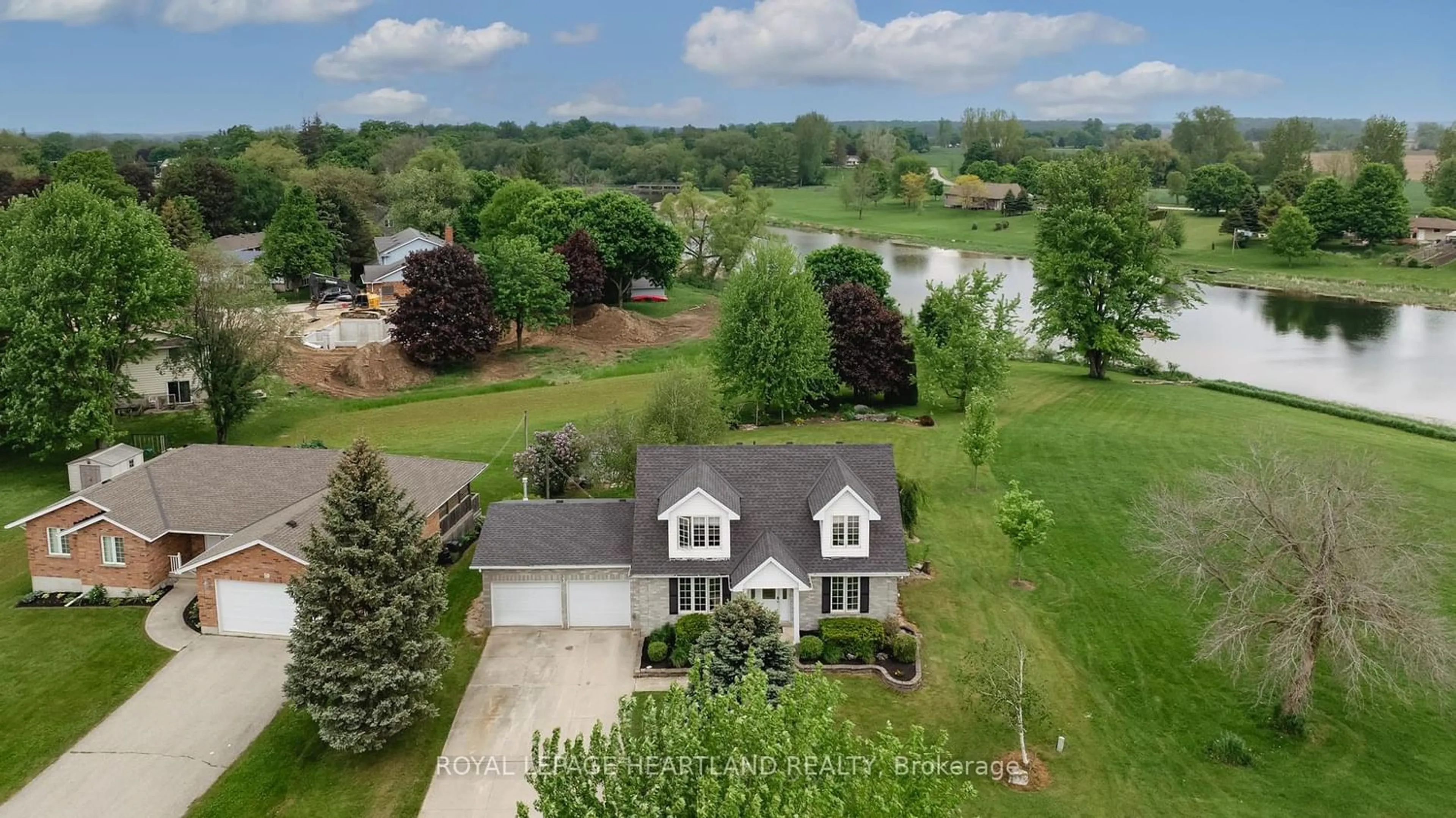 Frontside or backside of a home, the fenced backyard for 61 Mcdonald Dr, Huron East Ontario N0G 1H0