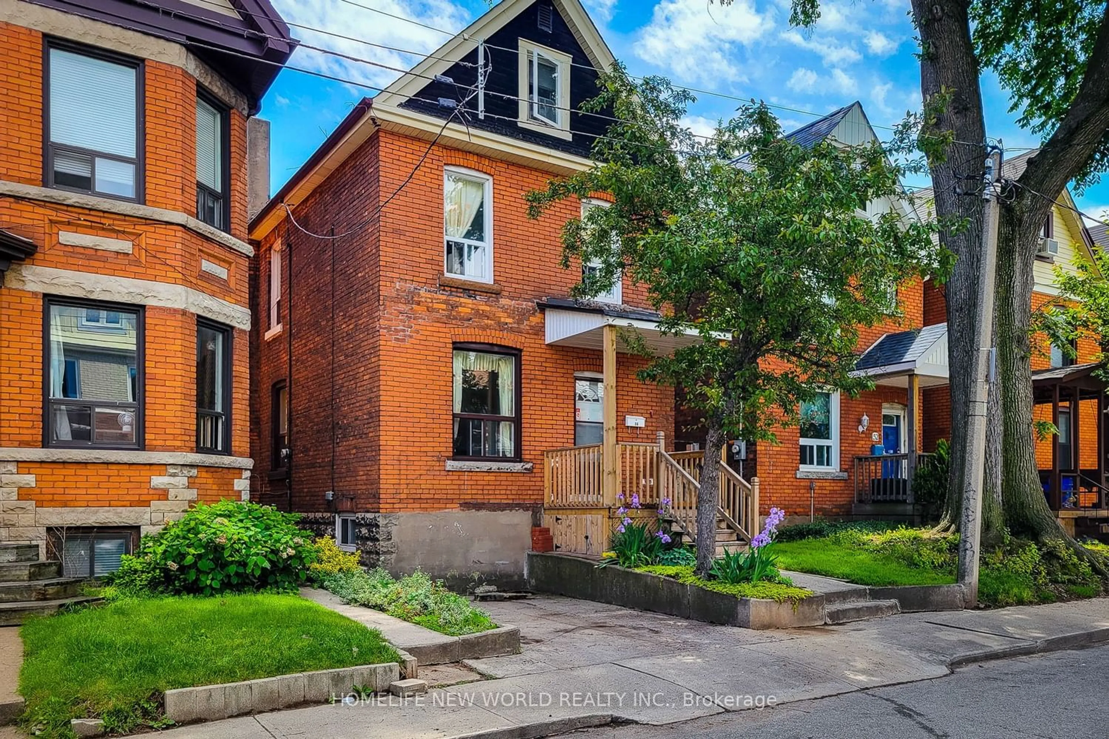 Home with brick exterior material for 56 Arthur Ave, Hamilton Ontario L8L 6C5