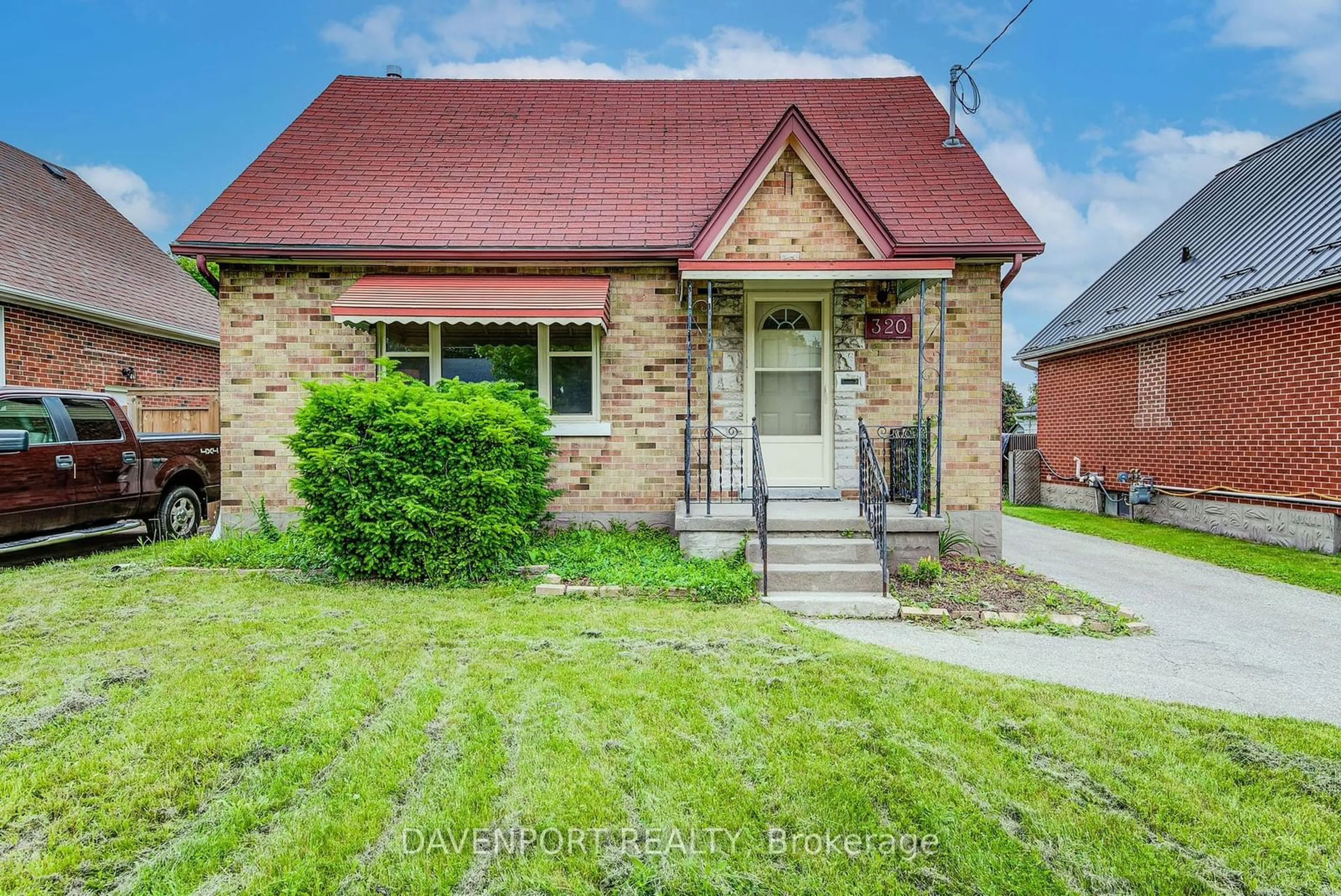 Frontside or backside of a home for 320 Highland Rd, Kitchener Ontario N2M 3W4