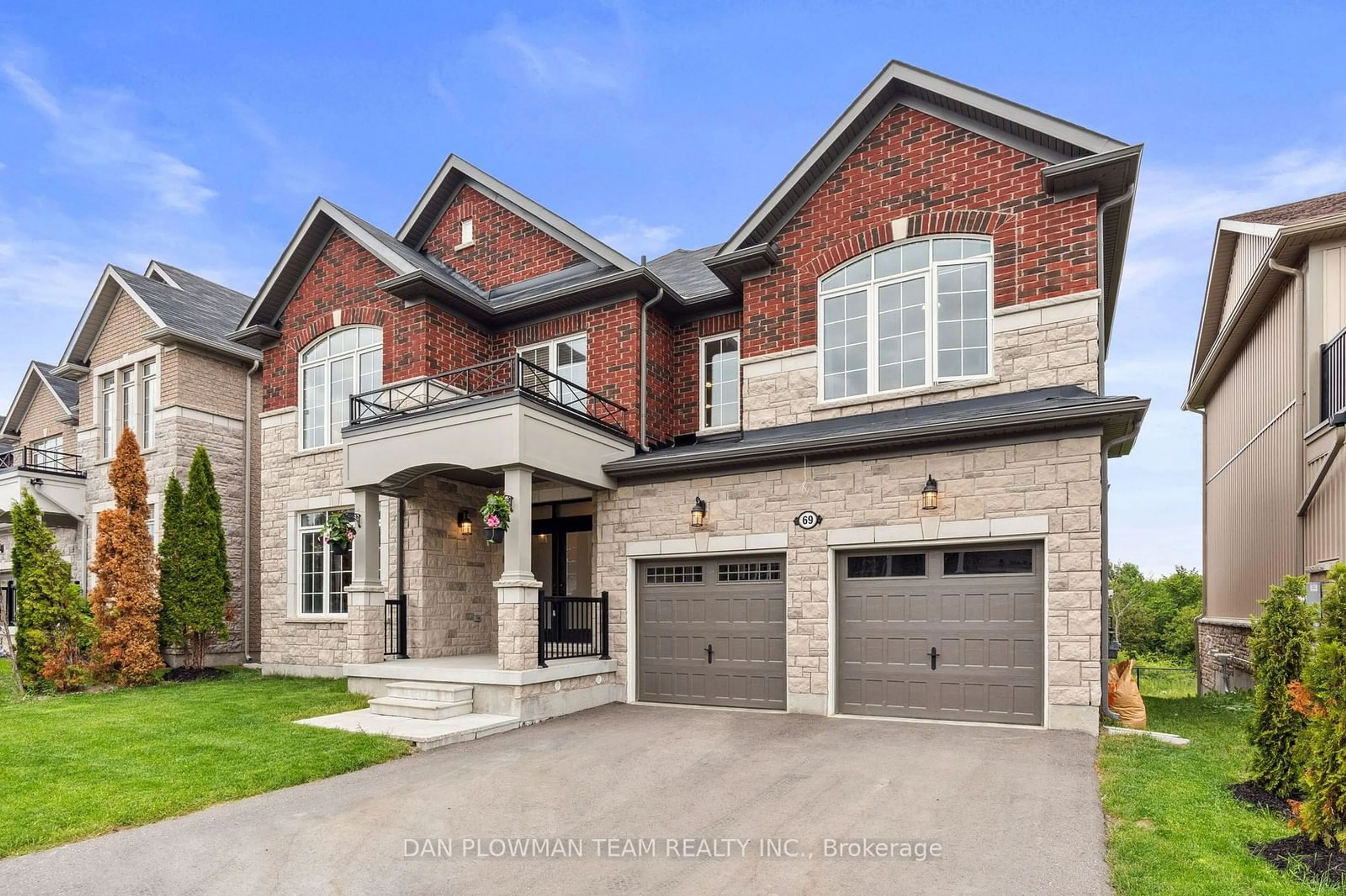 Home with brick exterior material for 69 Highlands Blvd, Cavan Monaghan Ontario L0A 1G0