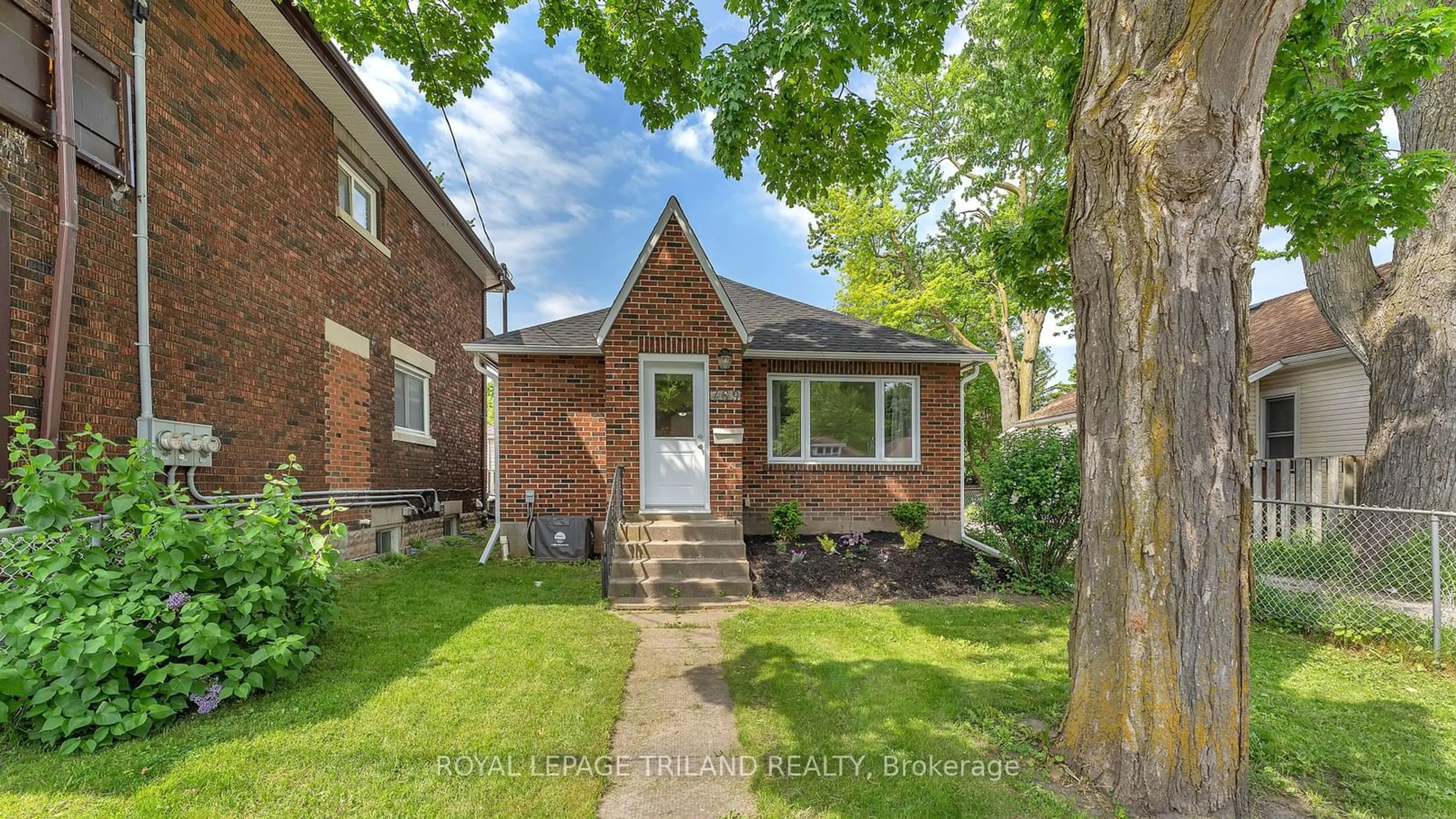 Home with brick exterior material for 769 Quebec St, London Ontario N5Y 1X3