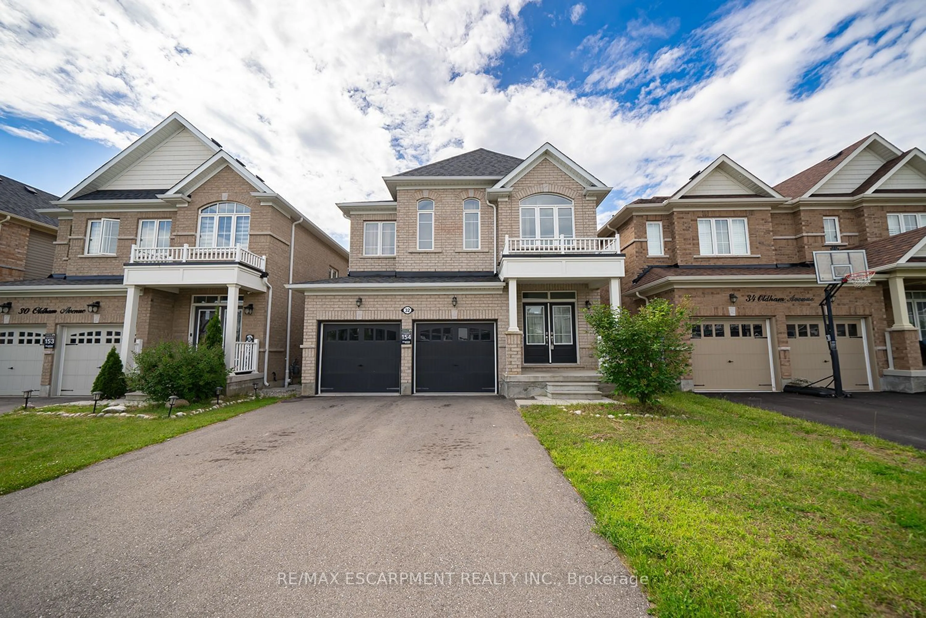 Frontside or backside of a home for 32 Oldham Ave, Brant Ontario N3L 3E2