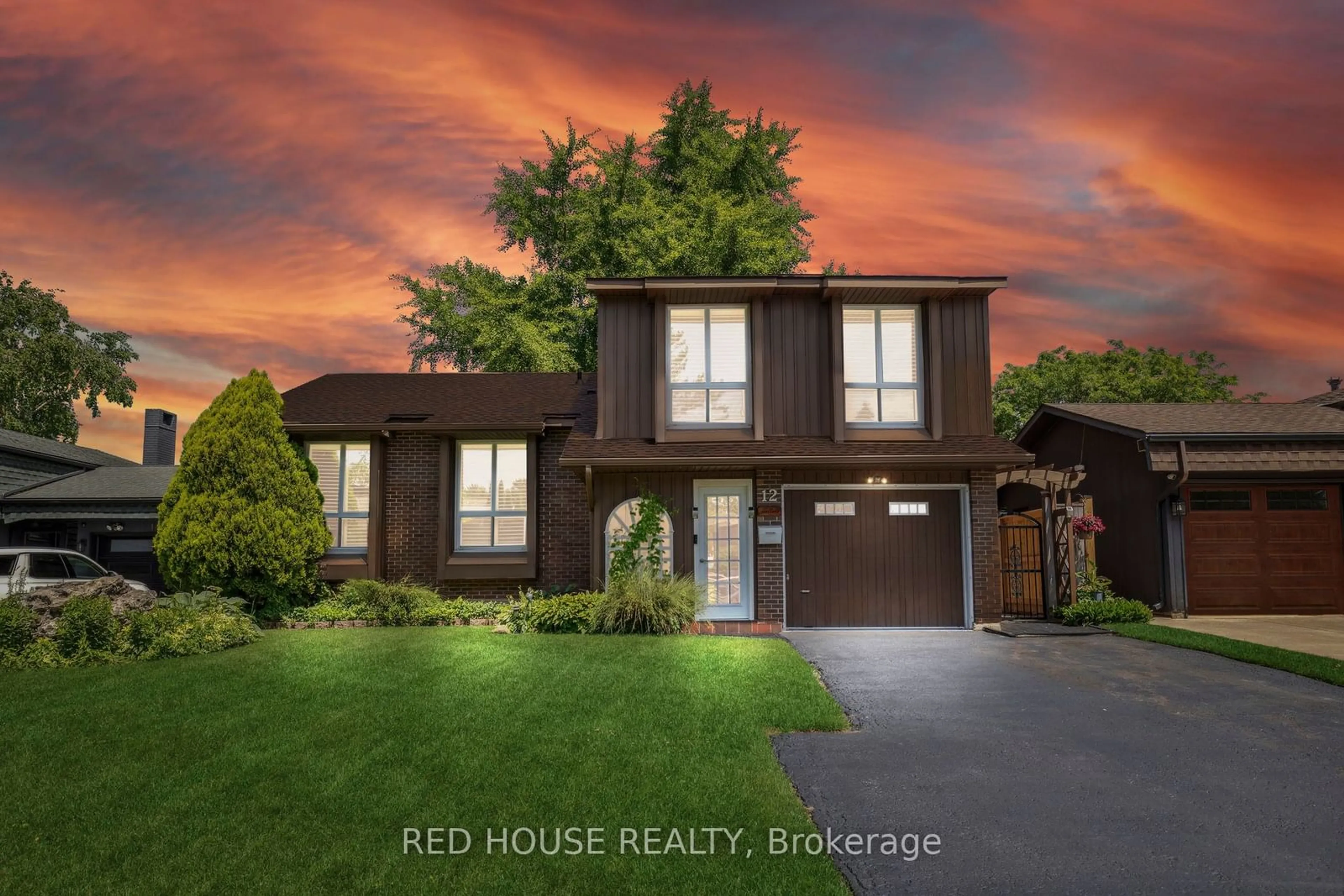 Frontside or backside of a home for 12 The Cedars, St. Catharines Ontario L2M 6M8