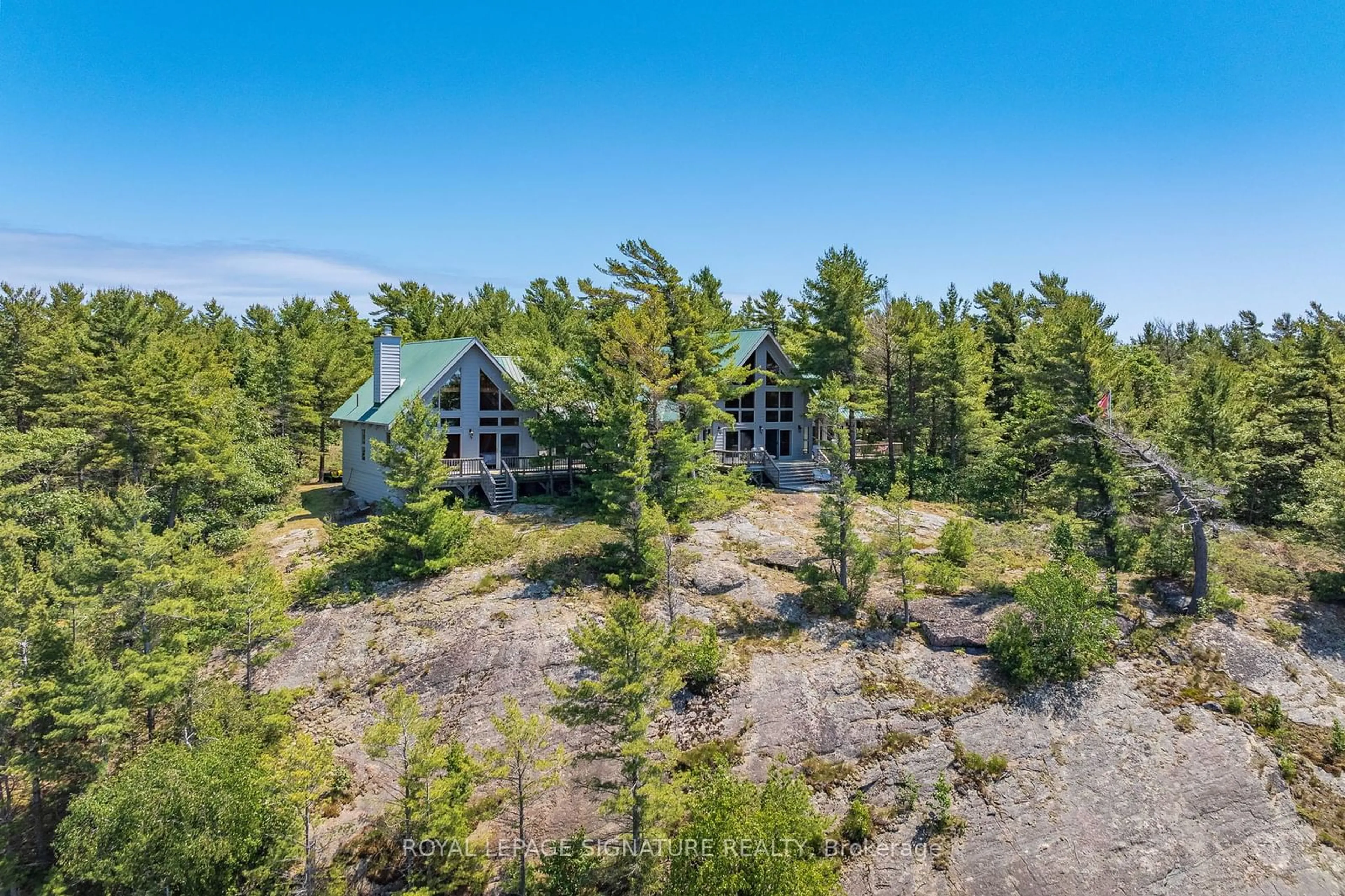 A pic from outside/outdoor area/front of a property/back of a property/a pic from drone, forest/trees view for B350 Echo Island, The Archipelago Ontario P2A 0A1