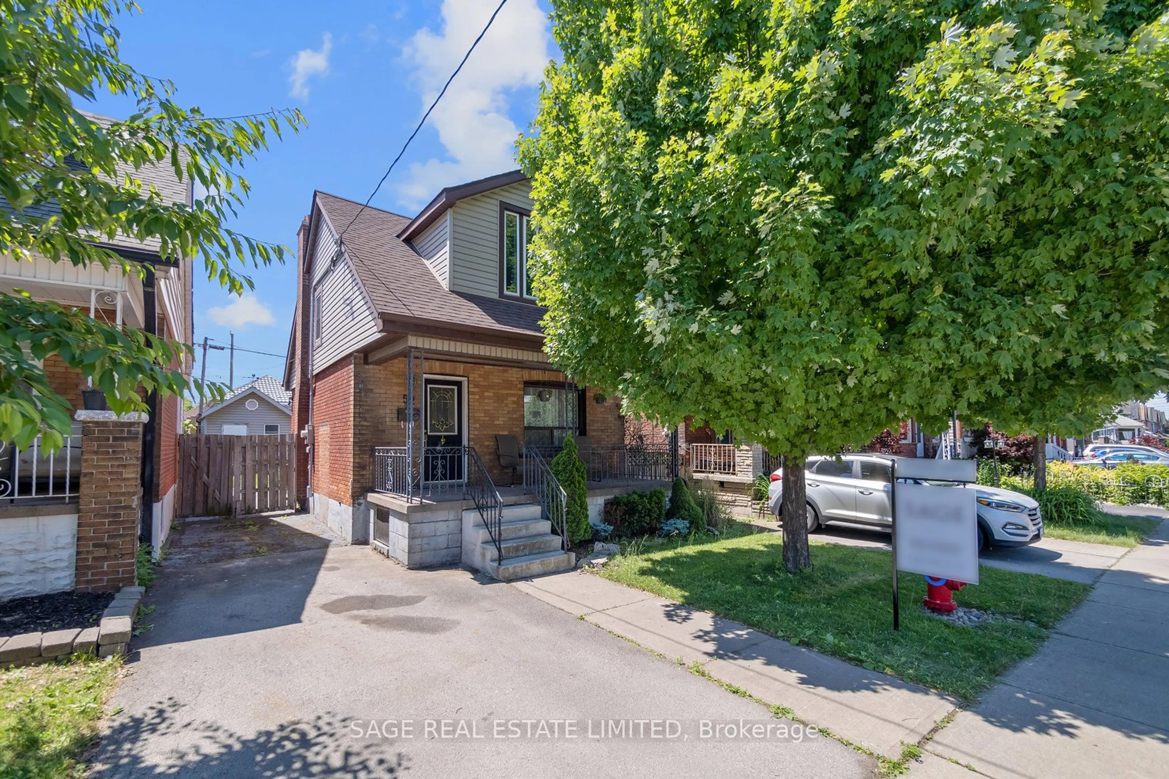 Frontside or backside of a home for 52 Dalkeith Ave, Hamilton Ontario L8L 3J2