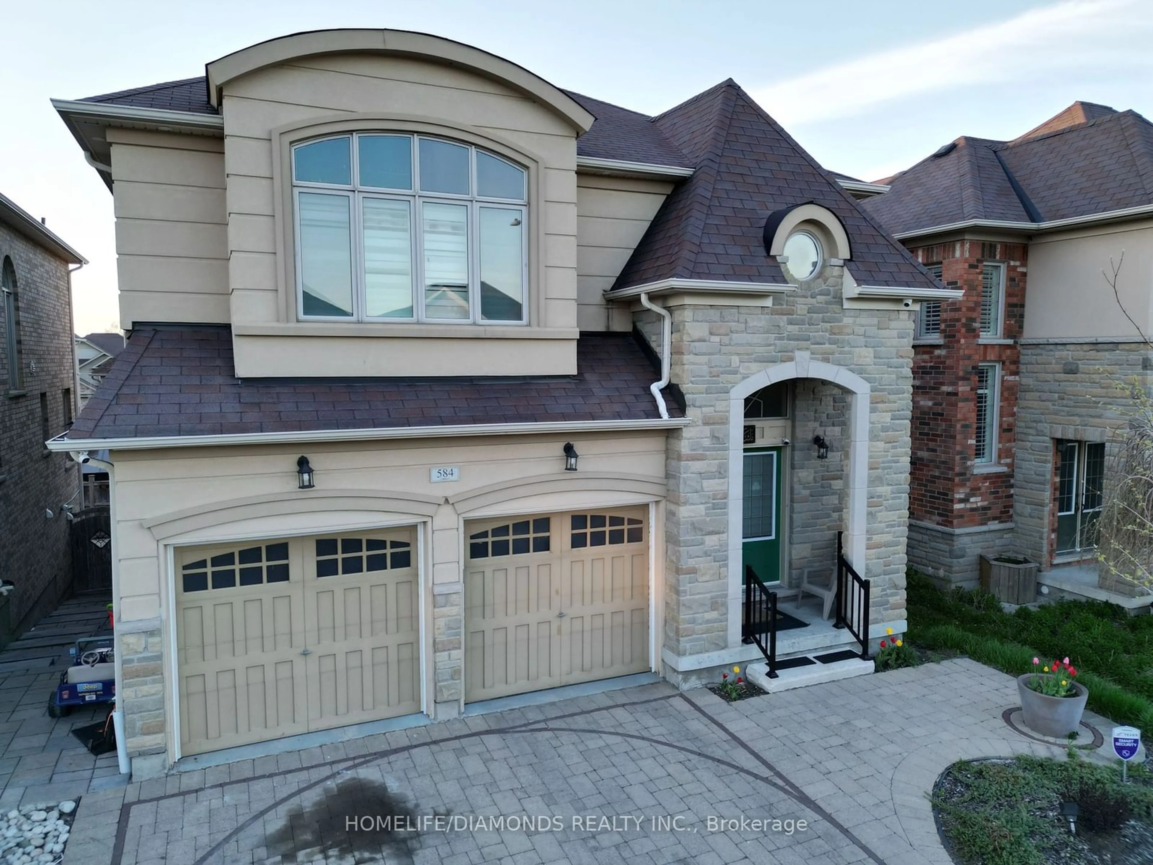 Home with brick exterior material for 584 PINERY Tr, Waterloo Ontario N2V 2Y3
