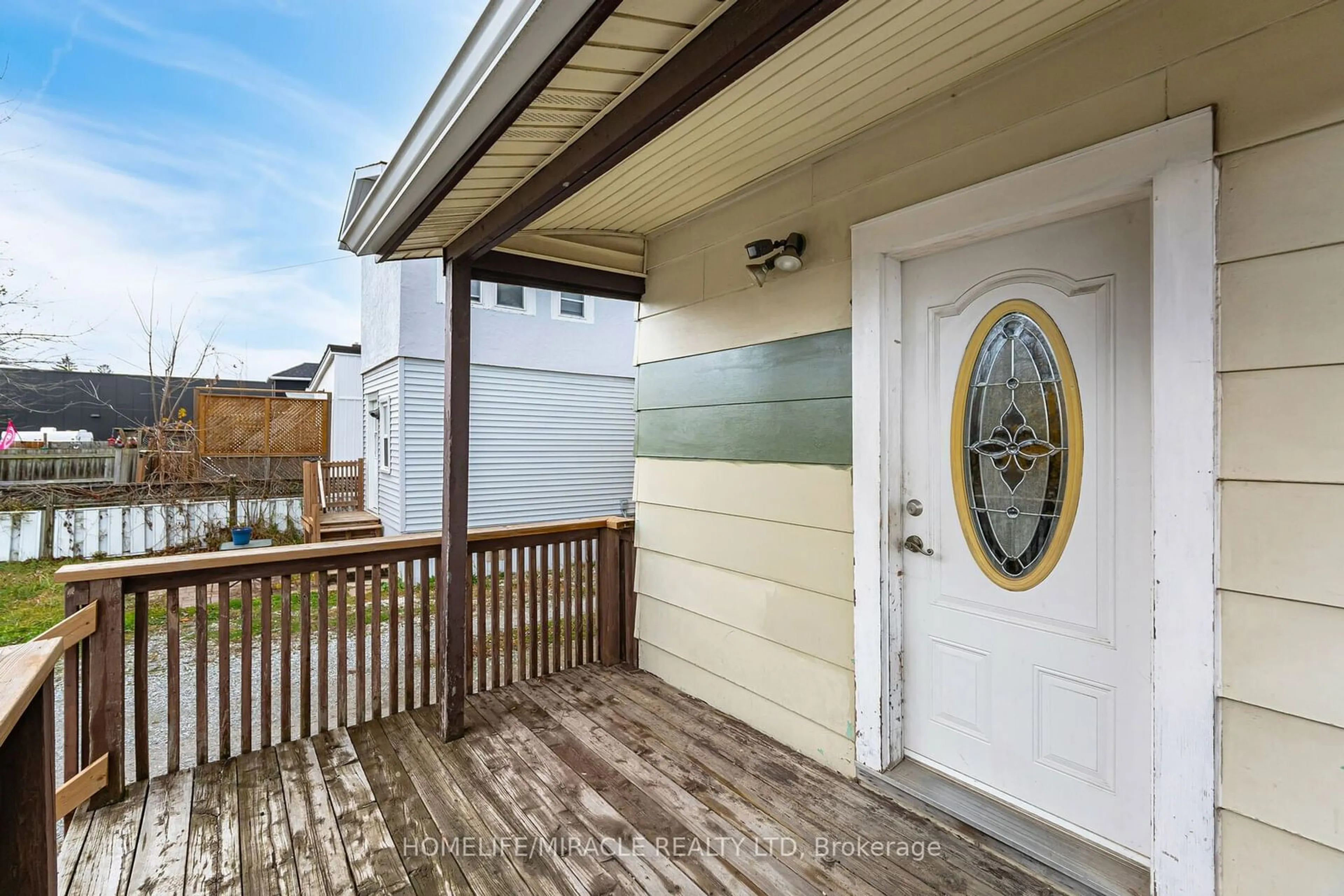 A pic from exterior of the house or condo, the fenced backyard for 465 E MAIN St, Welland Ontario L3B 3X7