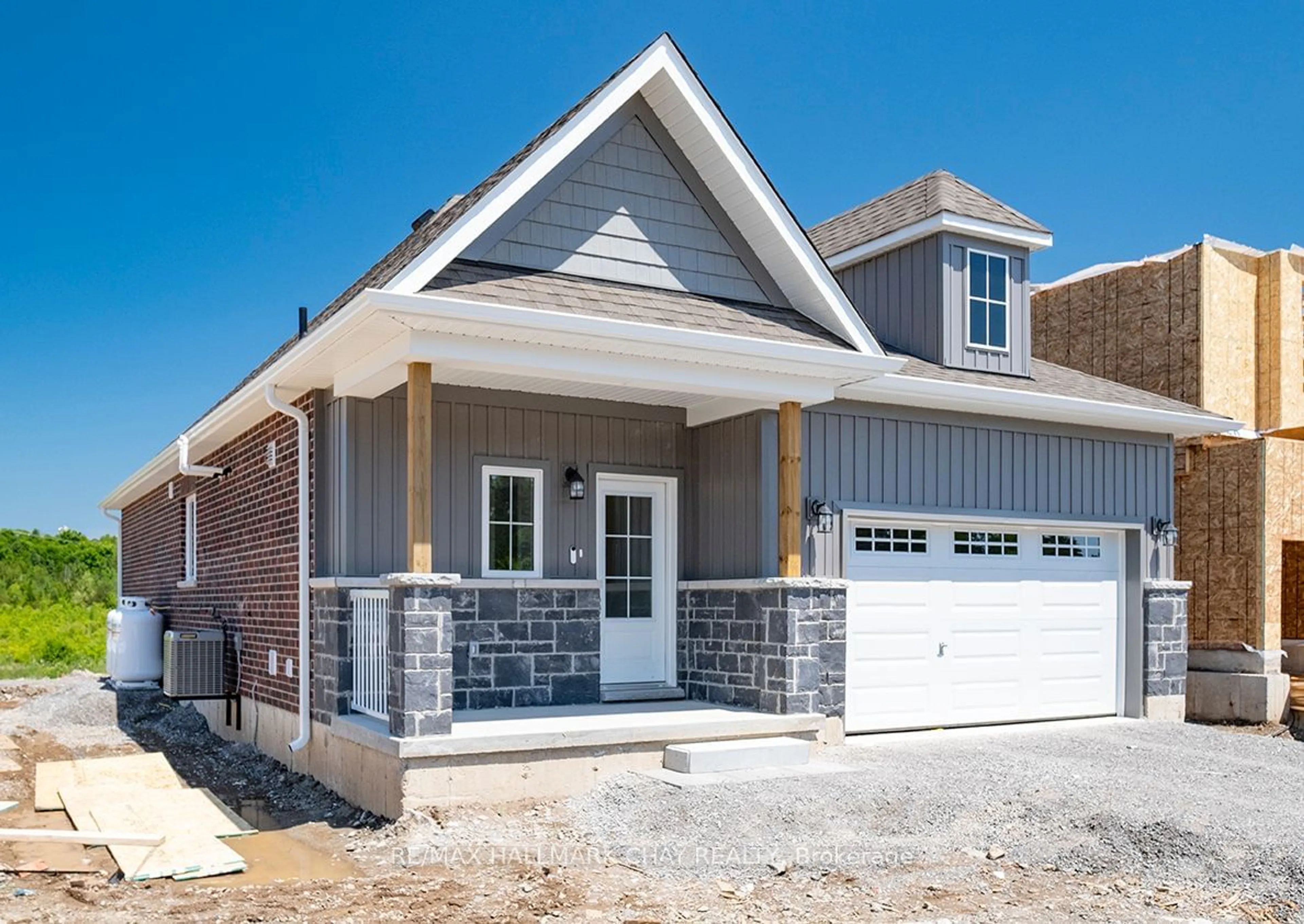 Home with brick exterior material for 64 Hillcroft Way, Kawartha Lakes Ontario K0M 1A0