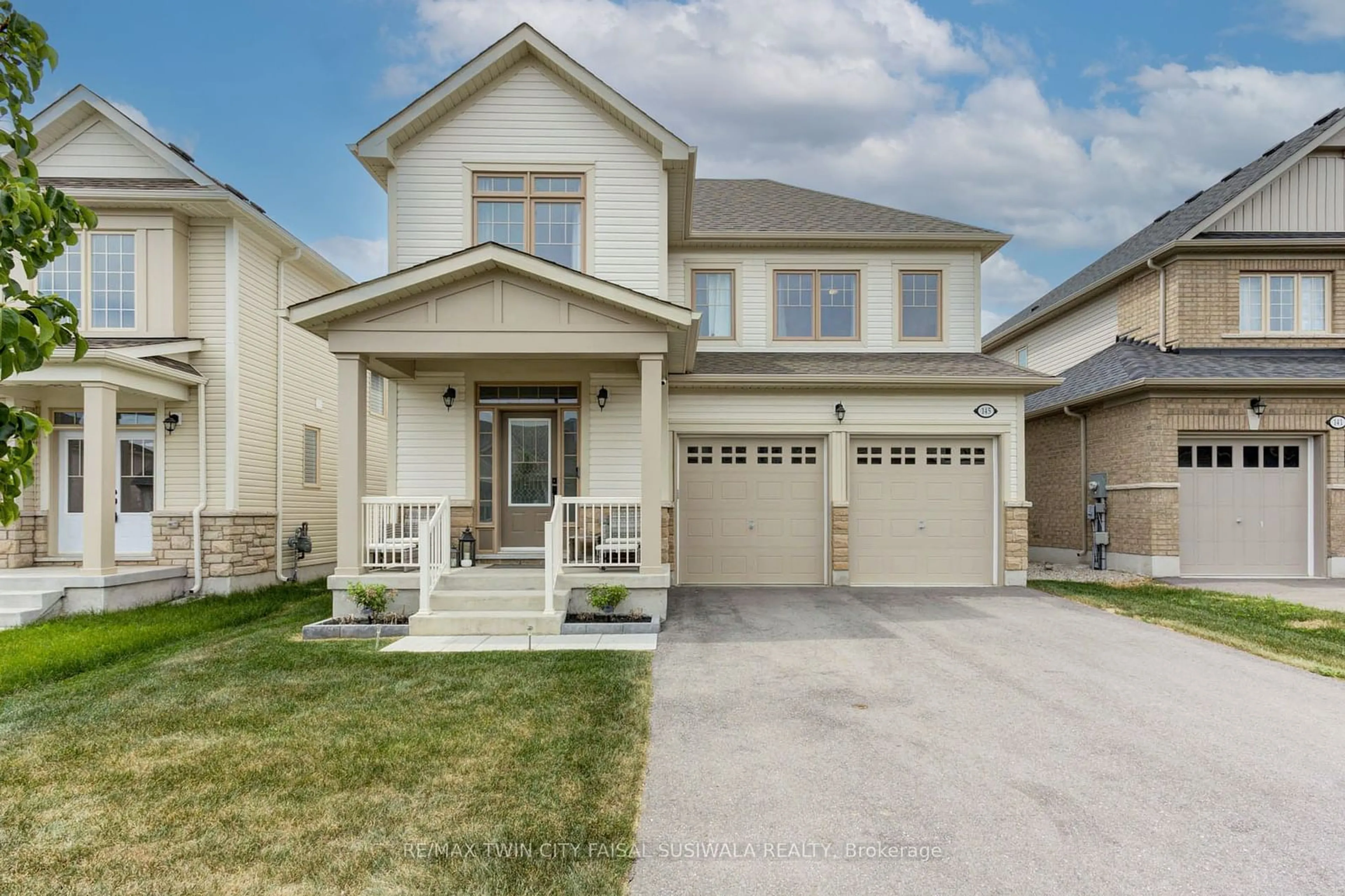 Frontside or backside of a home for 145 Harpin Way, Centre Wellington Ontario N1M 0G9