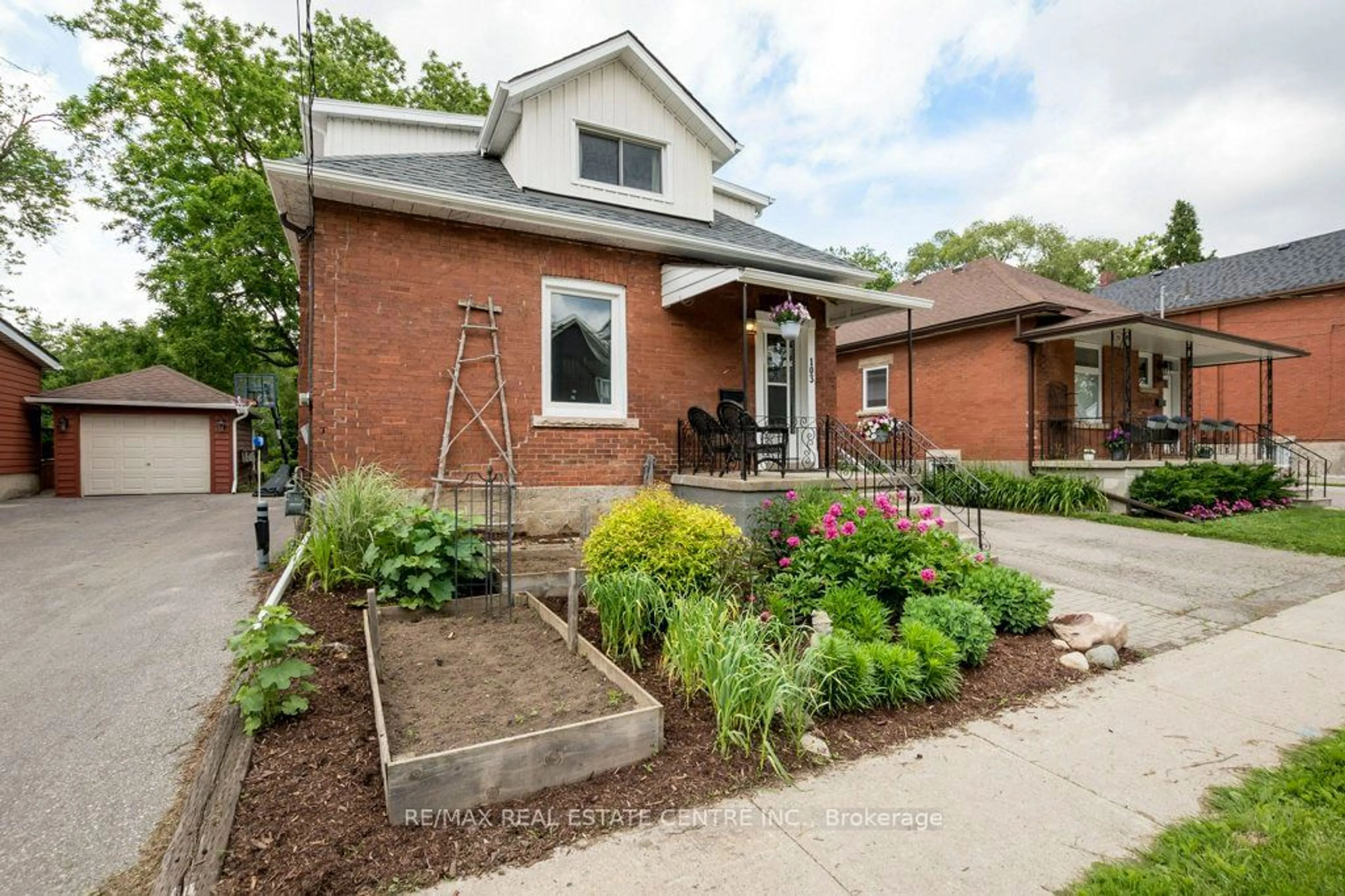 Home with brick exterior material for 103 Division St, Guelph Ontario N1H 1R7