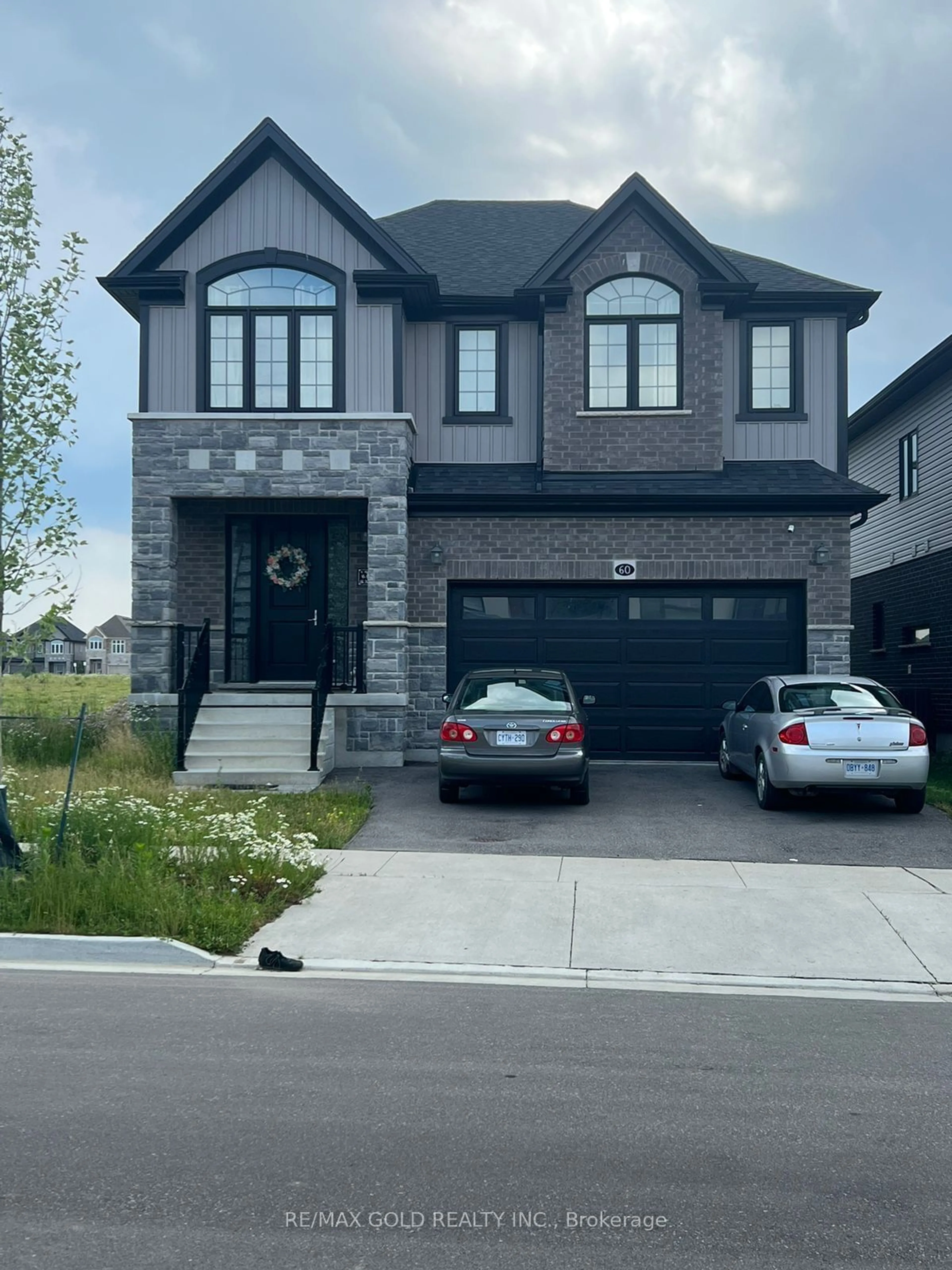 Frontside or backside of a home for 60 Monarch Woods Dr, Kitchener Ontario N2P 0K1