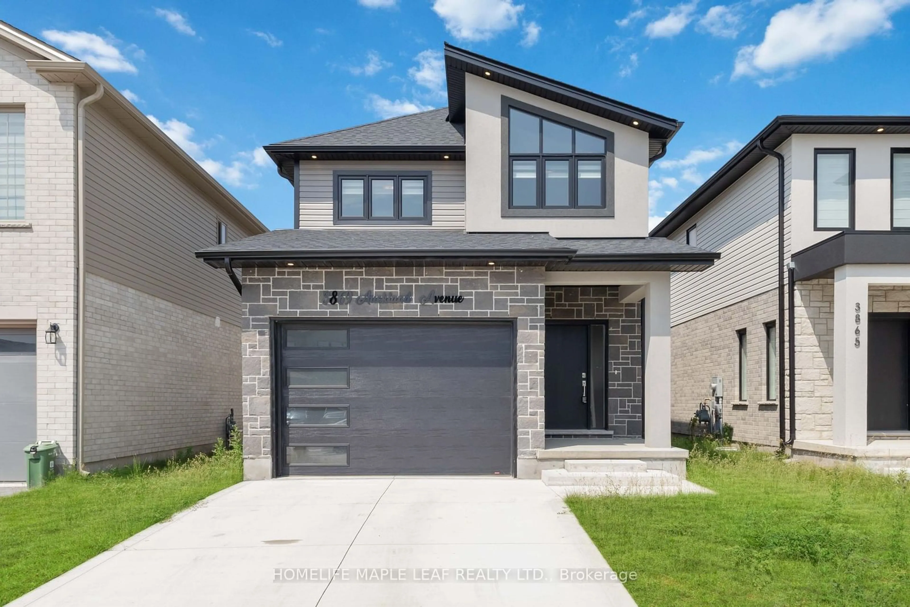 Frontside or backside of a home for 3869 Auckland Ave, London Ontario N6L 0J3