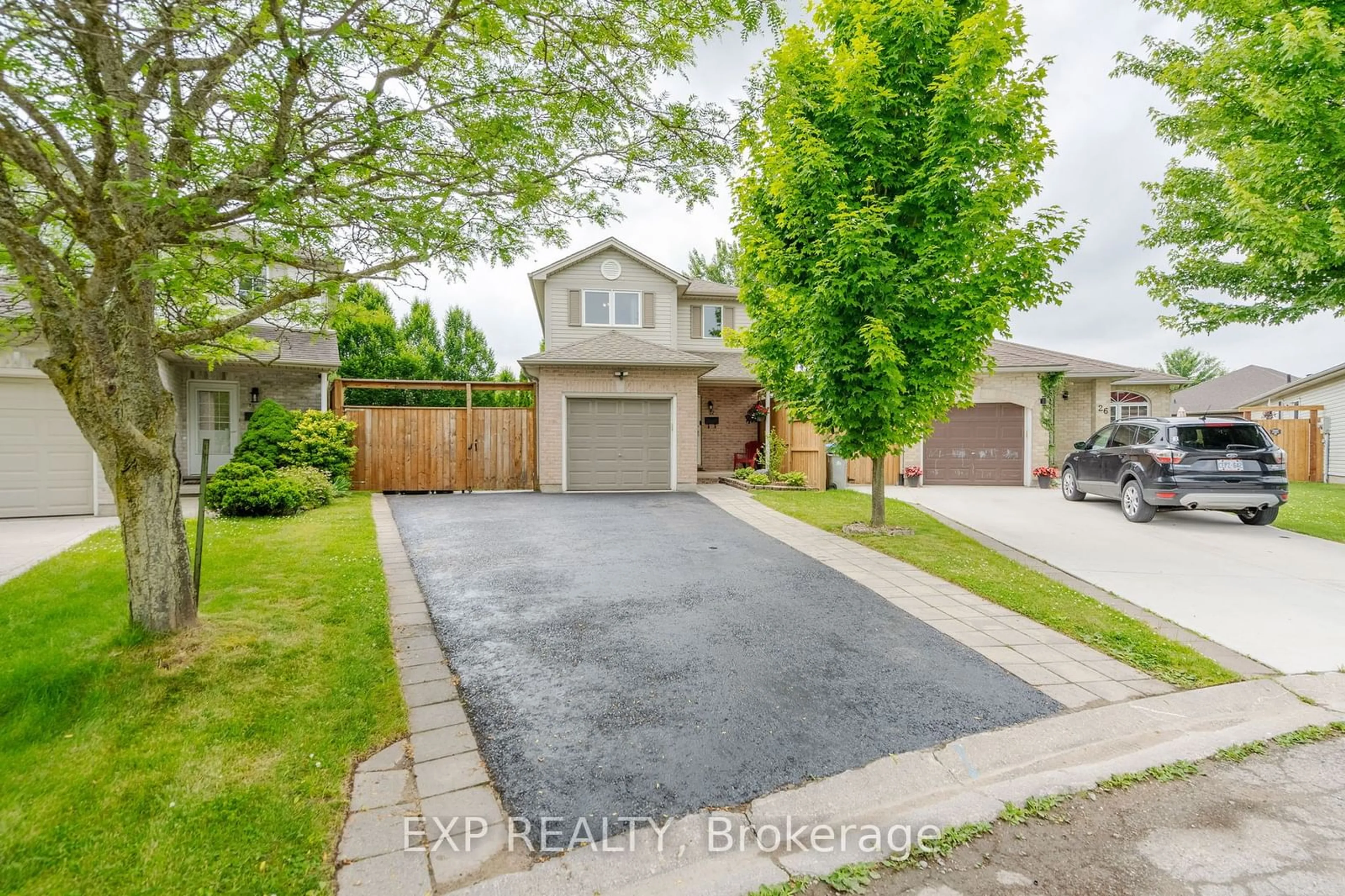 Frontside or backside of a home, the street view for 22 Kristen Crt, Middlesex Centre Ontario N0L 1R0