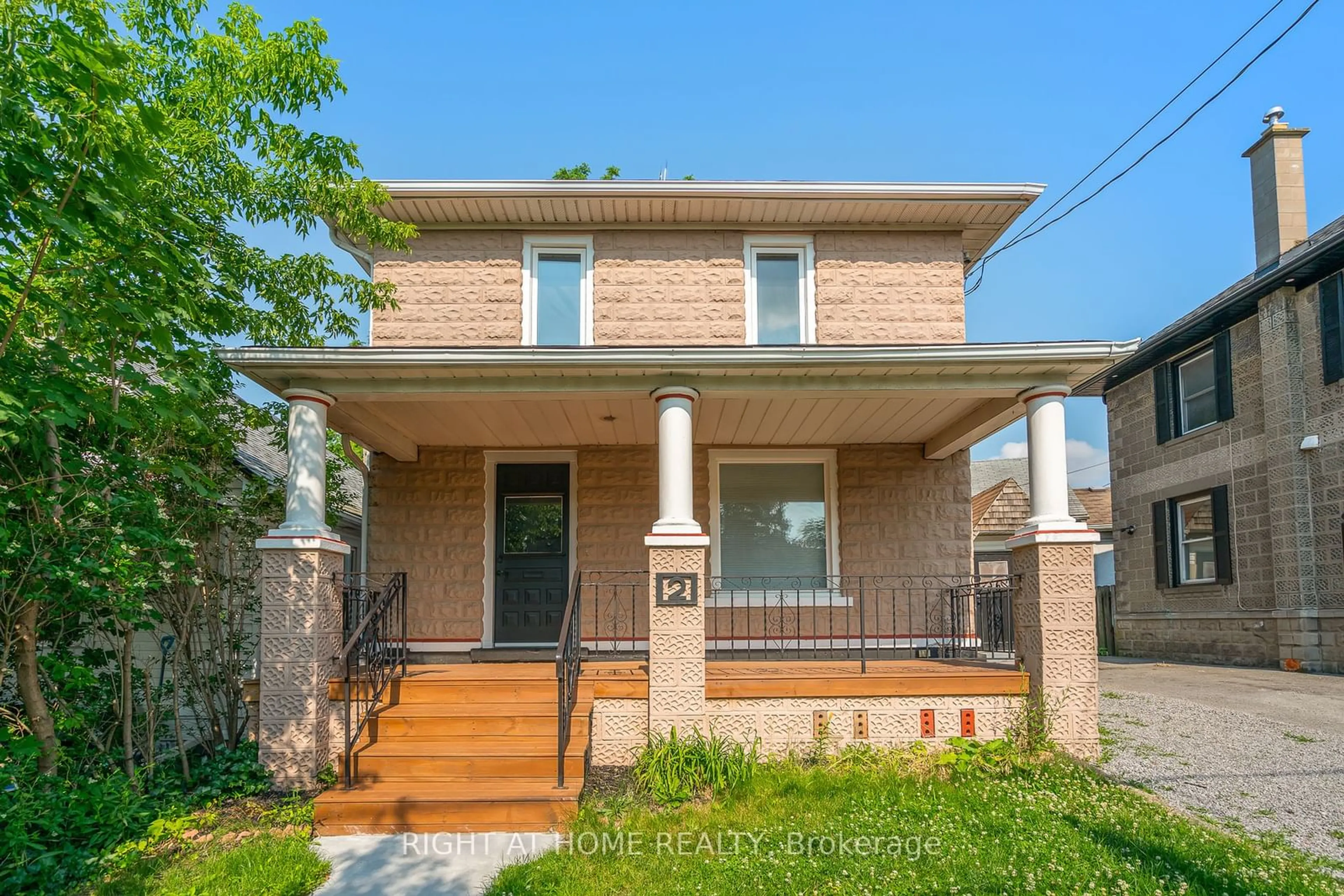 Home with brick exterior material for 2 Berryman Ave, St. Catharines Ontario L2R 3W9