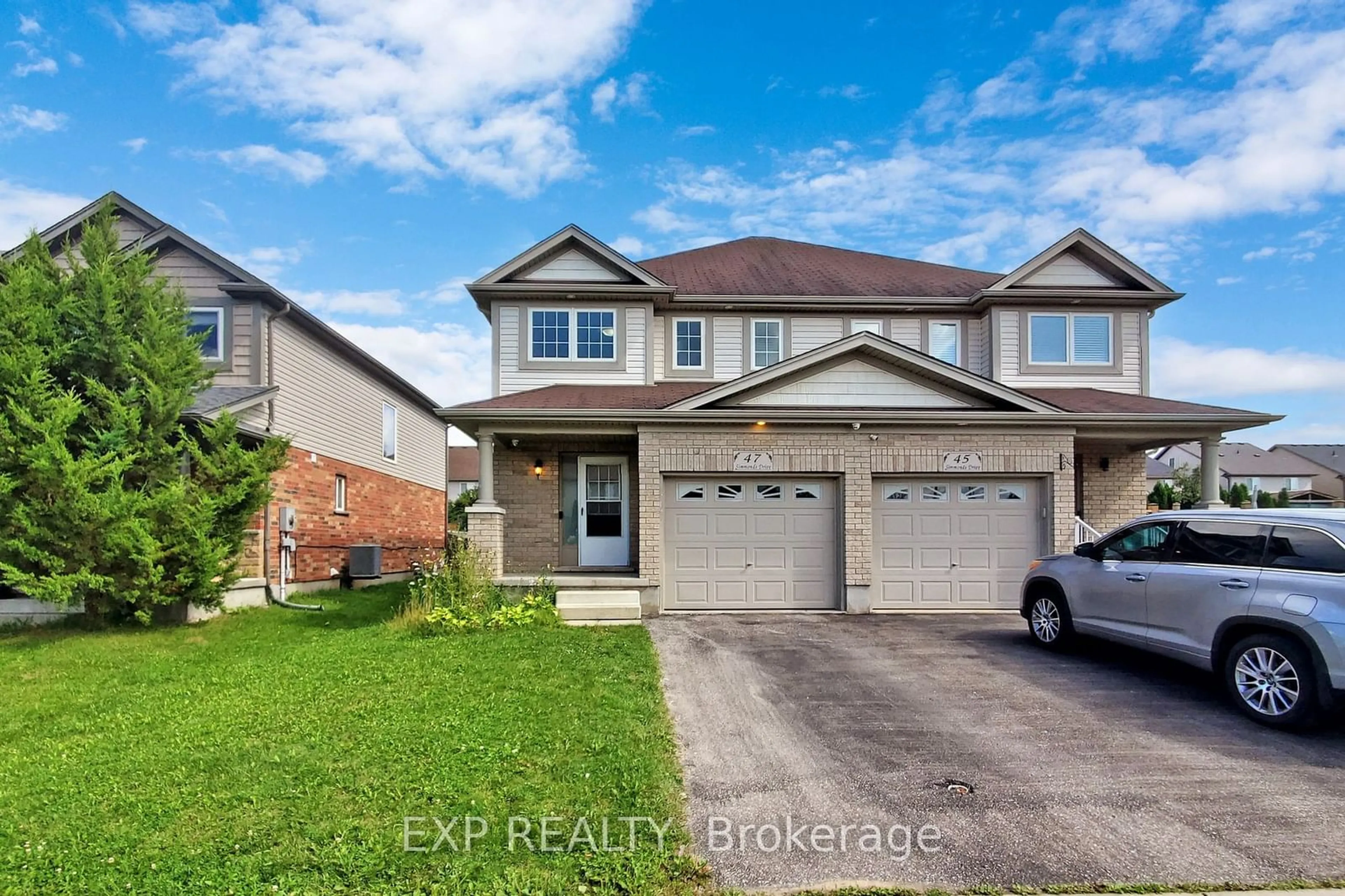 Frontside or backside of a home for 47 Simmonds Dr, Guelph Ontario N1E 0A9