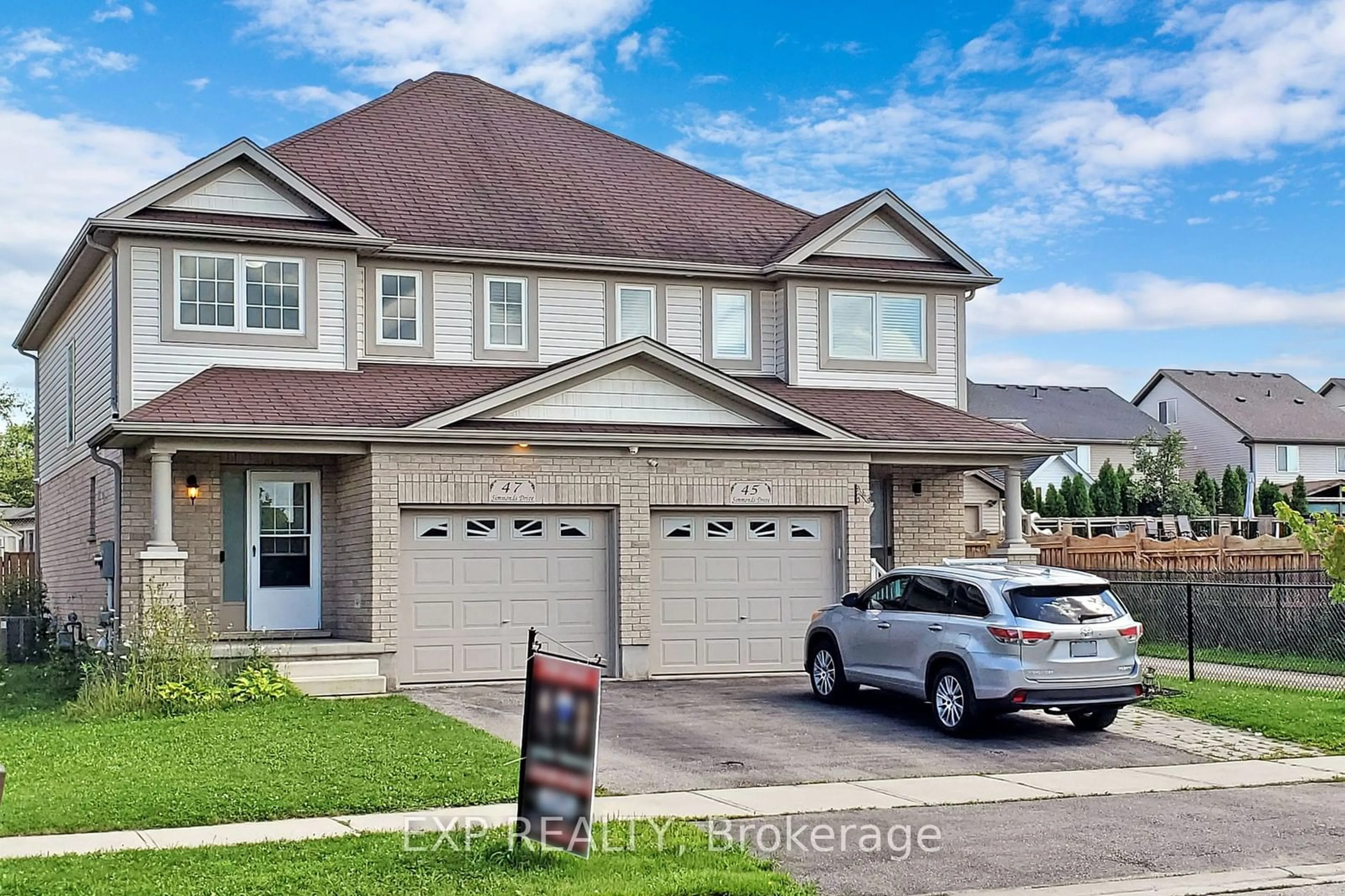 Frontside or backside of a home for 47 Simmonds Dr, Guelph Ontario N1E 0A9