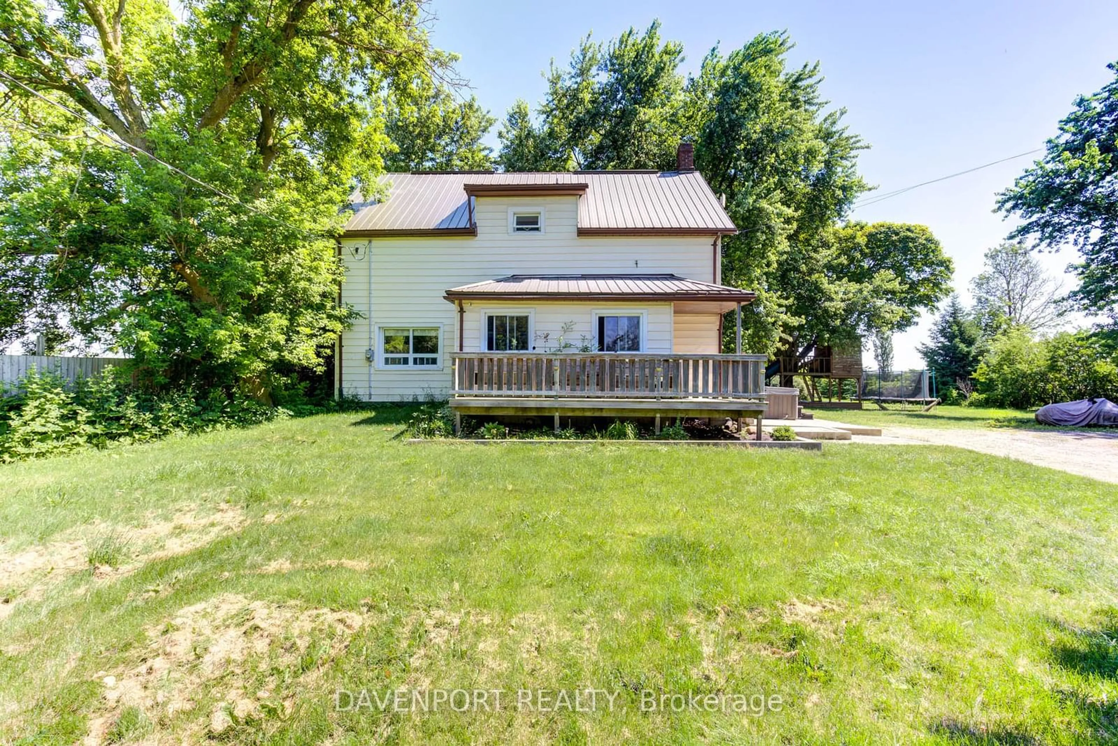 Frontside or backside of a home, the fenced backyard for 9499 Maas Park Dr, Wellington North Ontario N0G 2L0