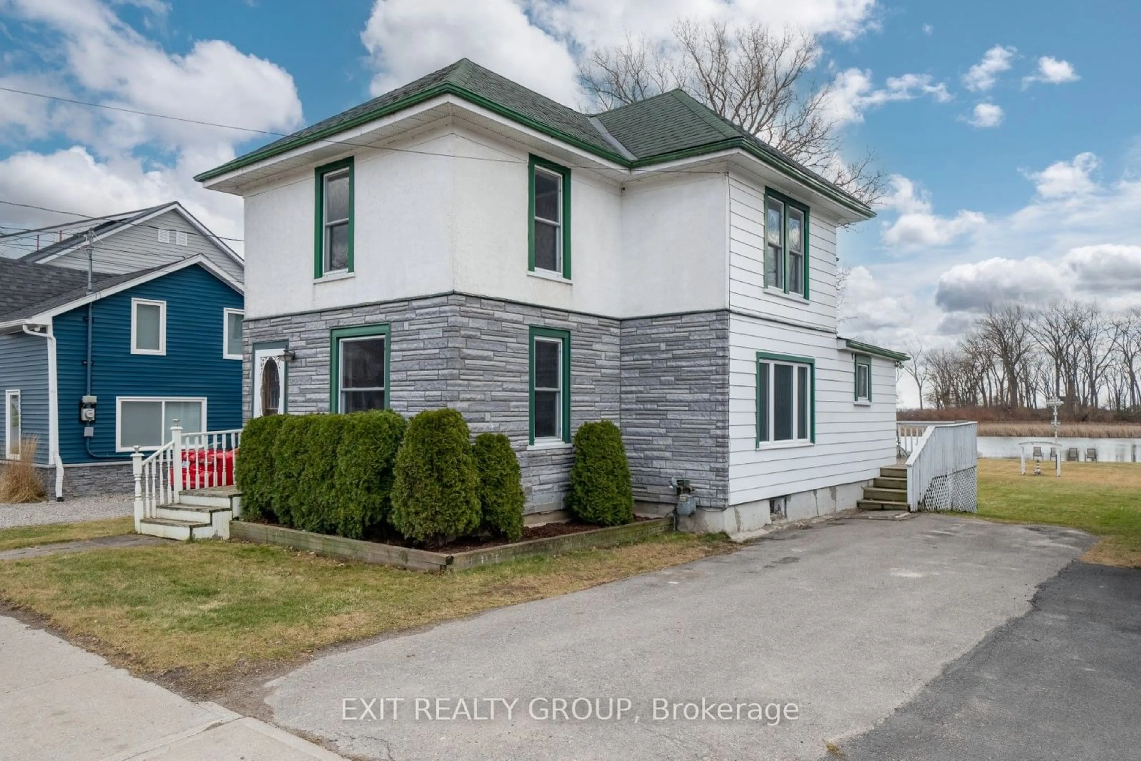 Frontside or backside of a home for 163 Main St, Prince Edward County Ontario K0K 3L0
