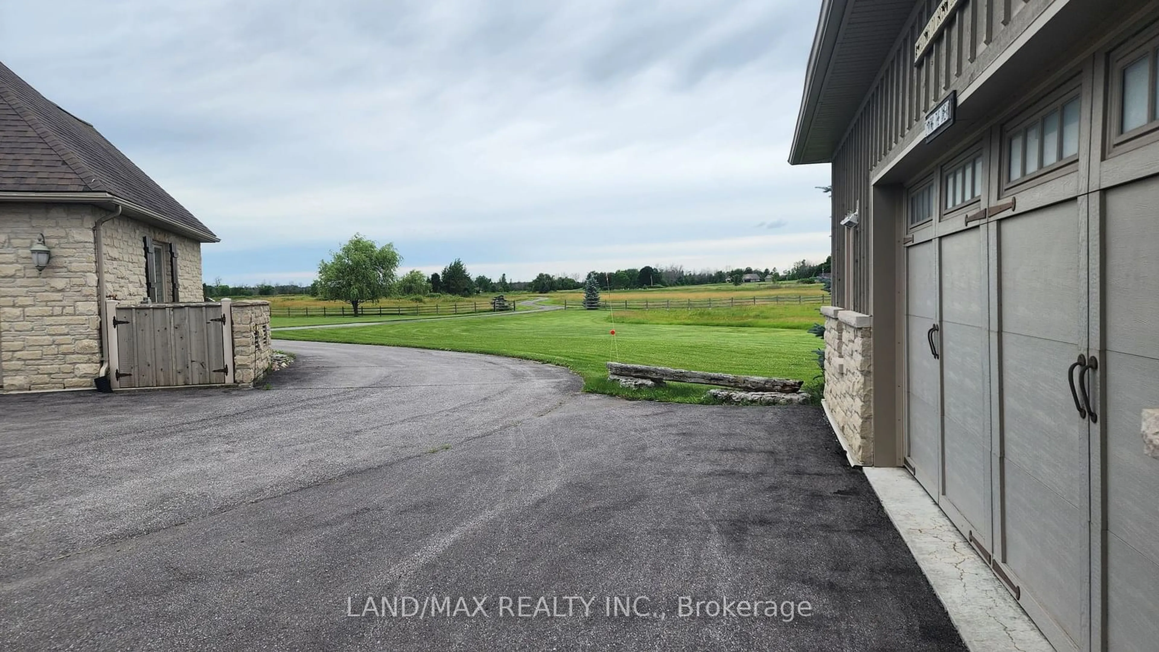 A pic from exterior of the house or condo, the fenced backyard for 1632 County Rd 11, Stone Mills Ontario K7R 3L2