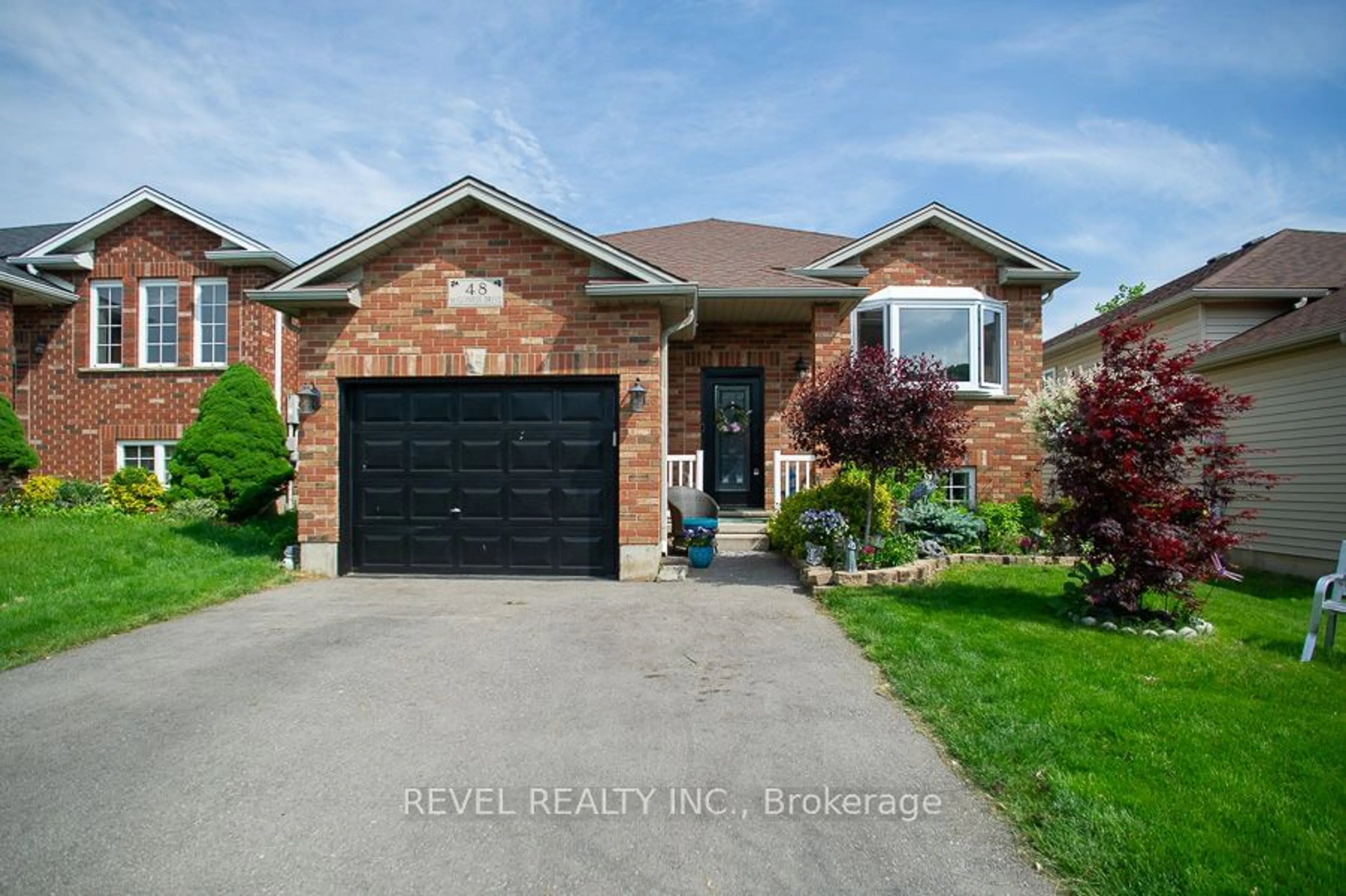 Frontside or backside of a home for 48 McGuiness Dr, Brantford Ontario N3T 6M6