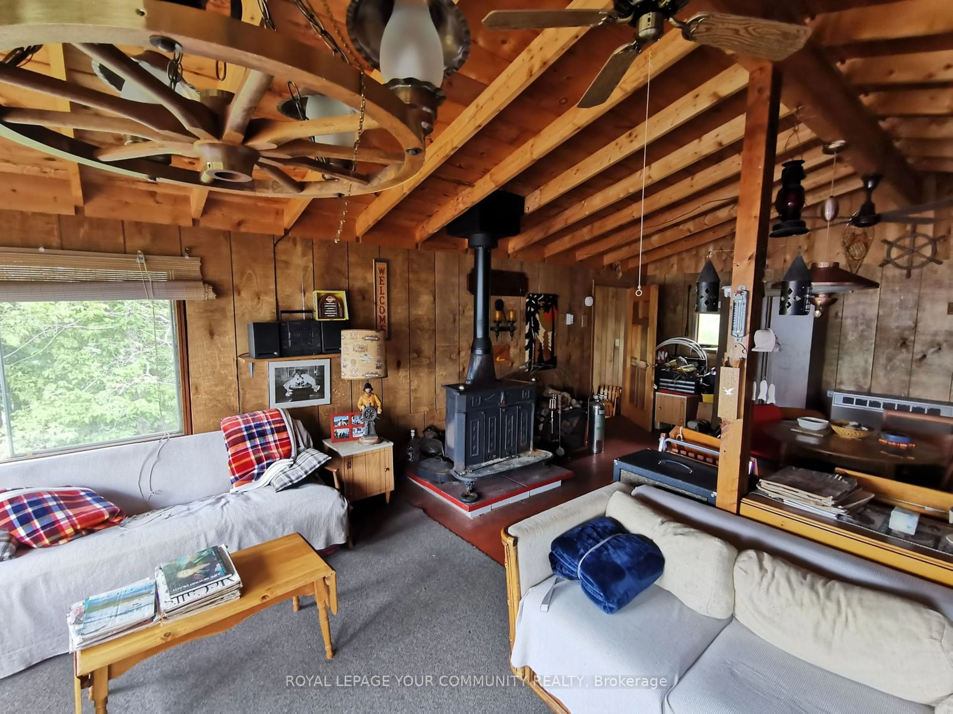 Living room, wood floors for 992 Porter Landing Rd, Parry Sound Remote Area Ontario P0H 2R0