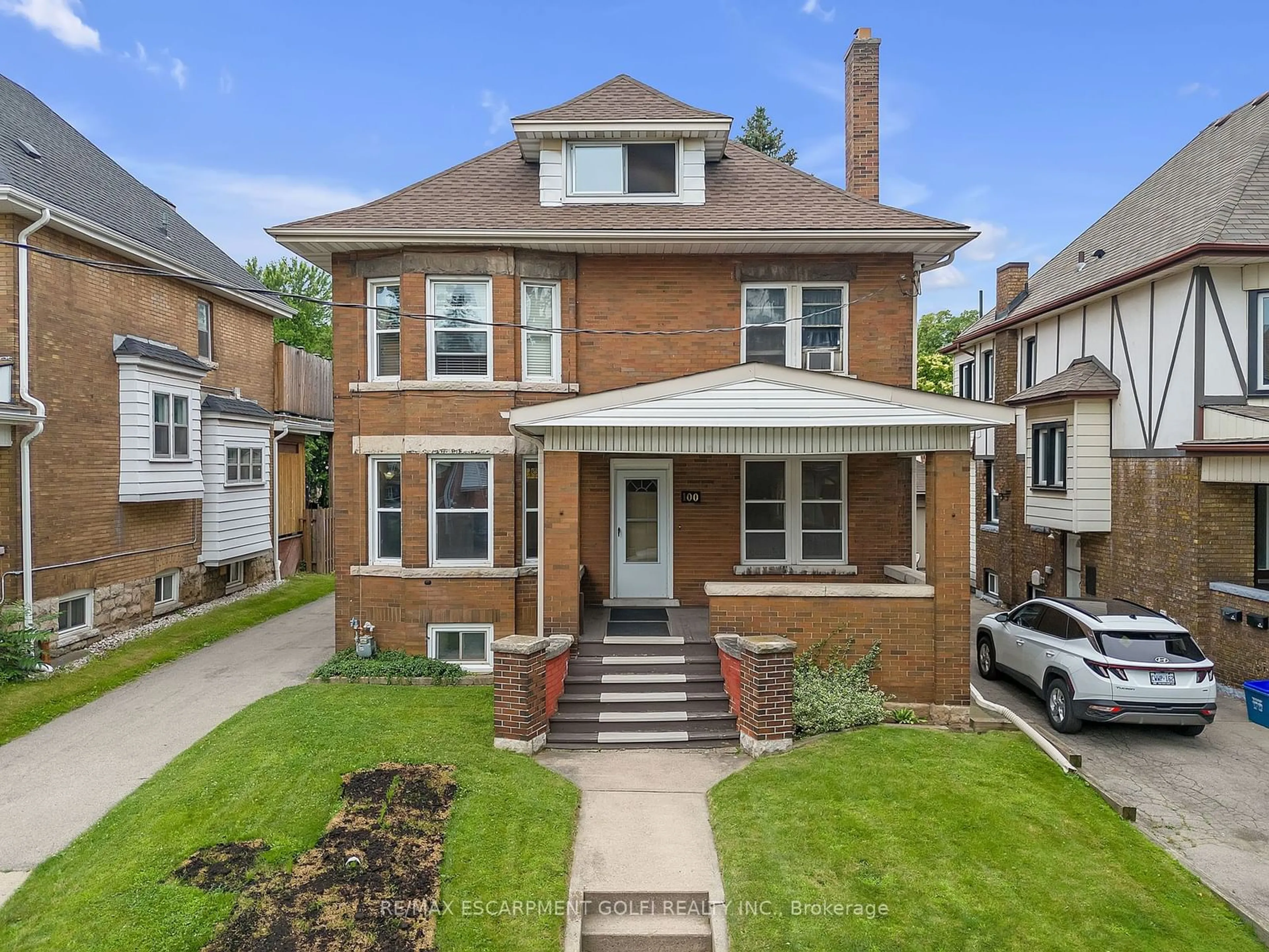 Frontside or backside of a home for 100 Balsam Ave, Hamilton Ontario L8M 3B3