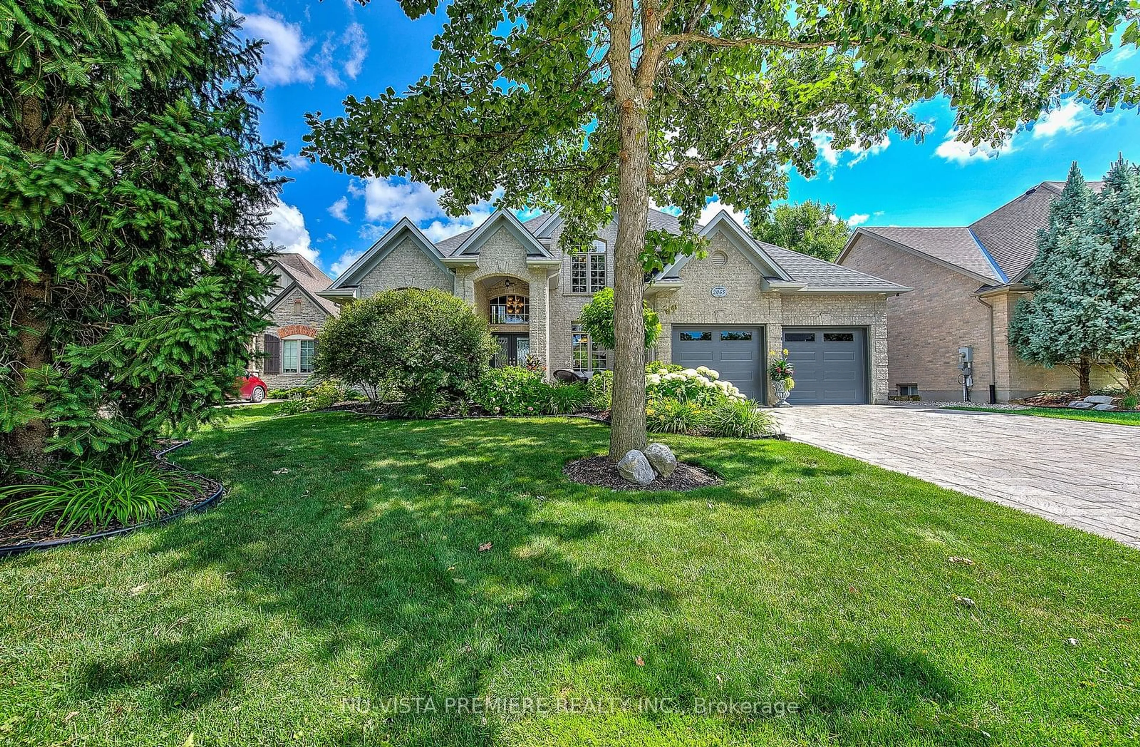 Frontside or backside of a home for 2065 Valleyrun Blvd, London Ontario N6G 5M7