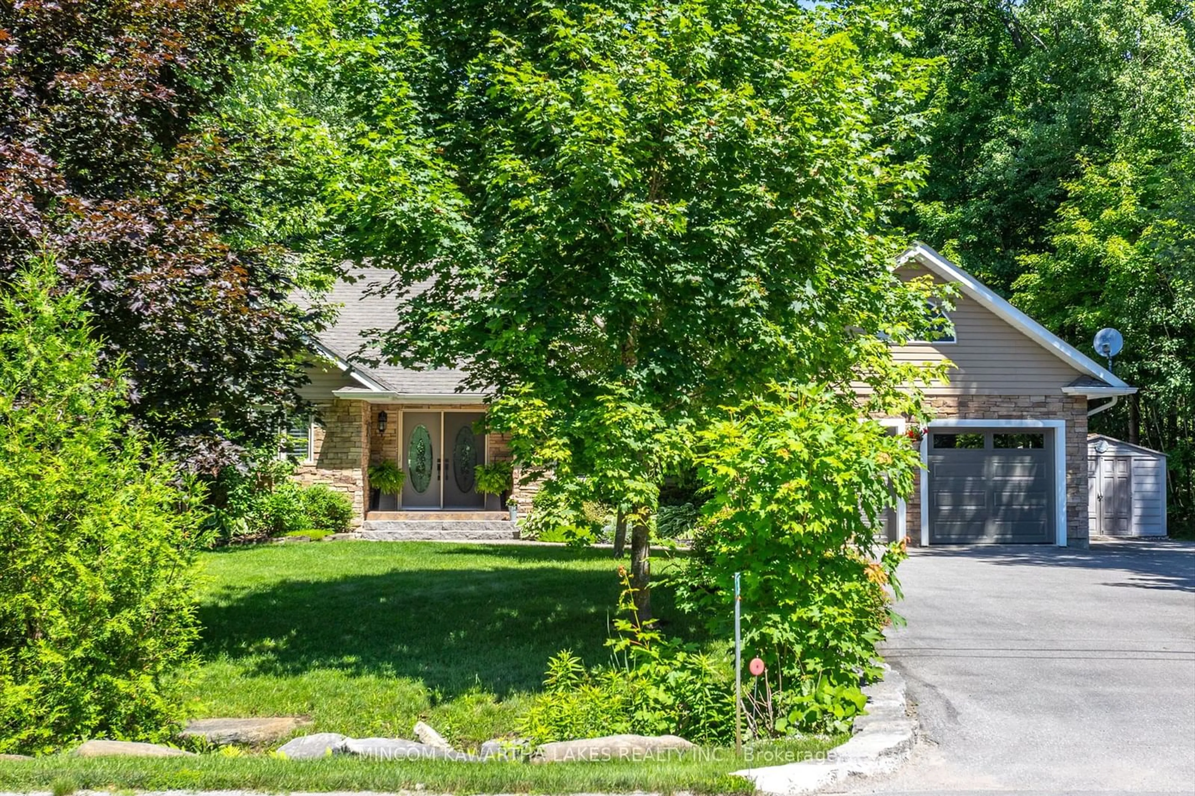 Frontside or backside of a home for 38 Sumcot Dr, Galway-Cavendish and Harvey Ontario K9J 6X2