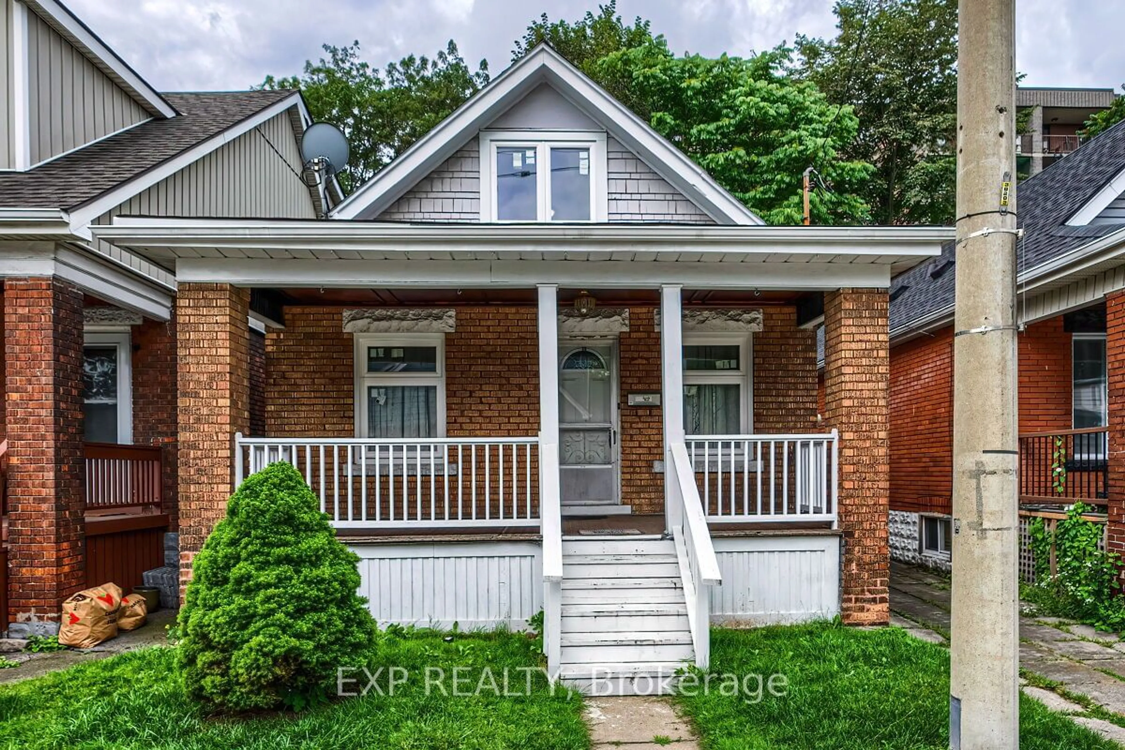 Home with brick exterior material for 30 Webber Ave, Hamilton Ontario L8N 1W3