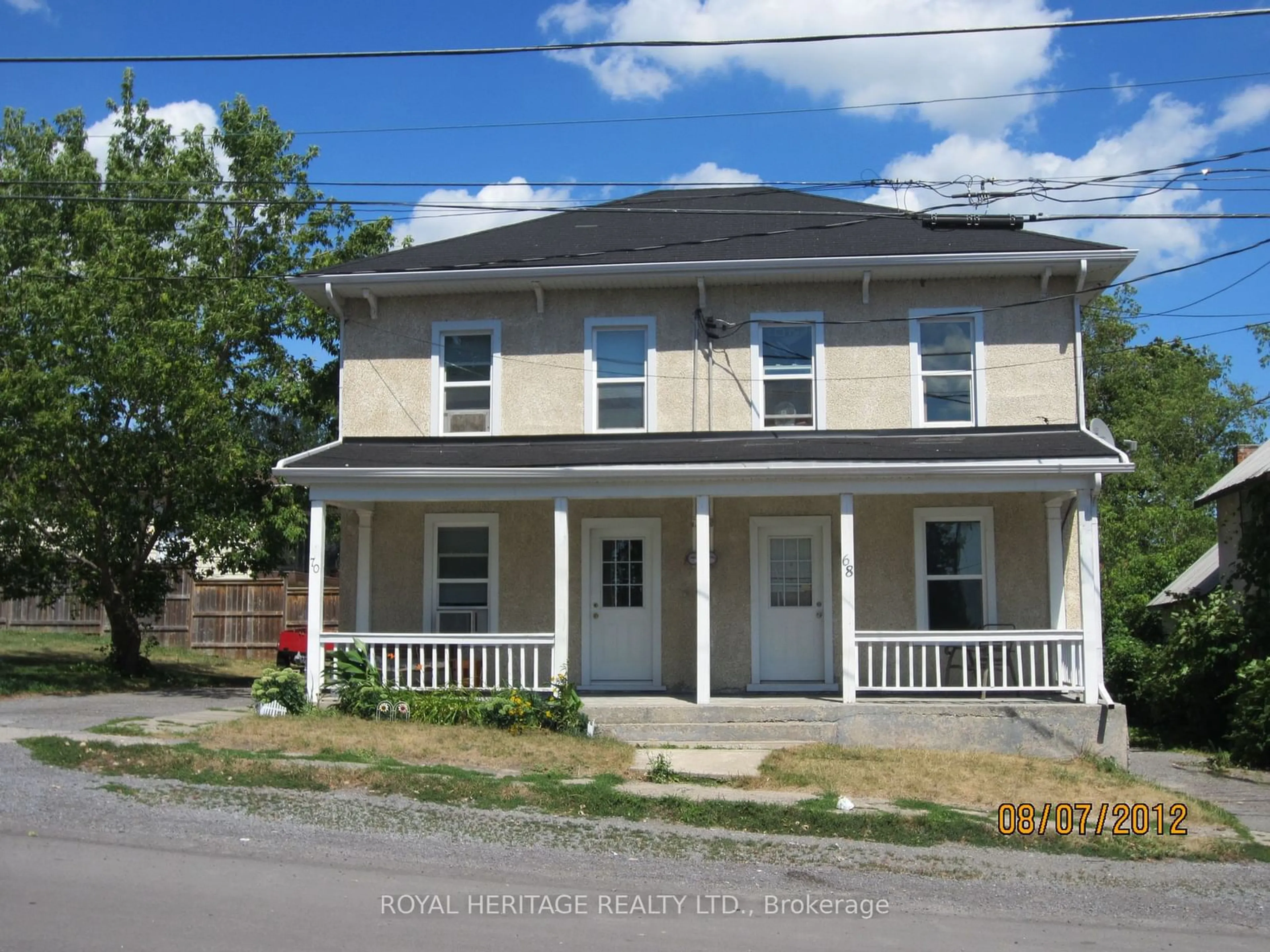 Frontside or backside of a home for 68 & 70 Fourth St, Deseronto Ontario K0K 1X0